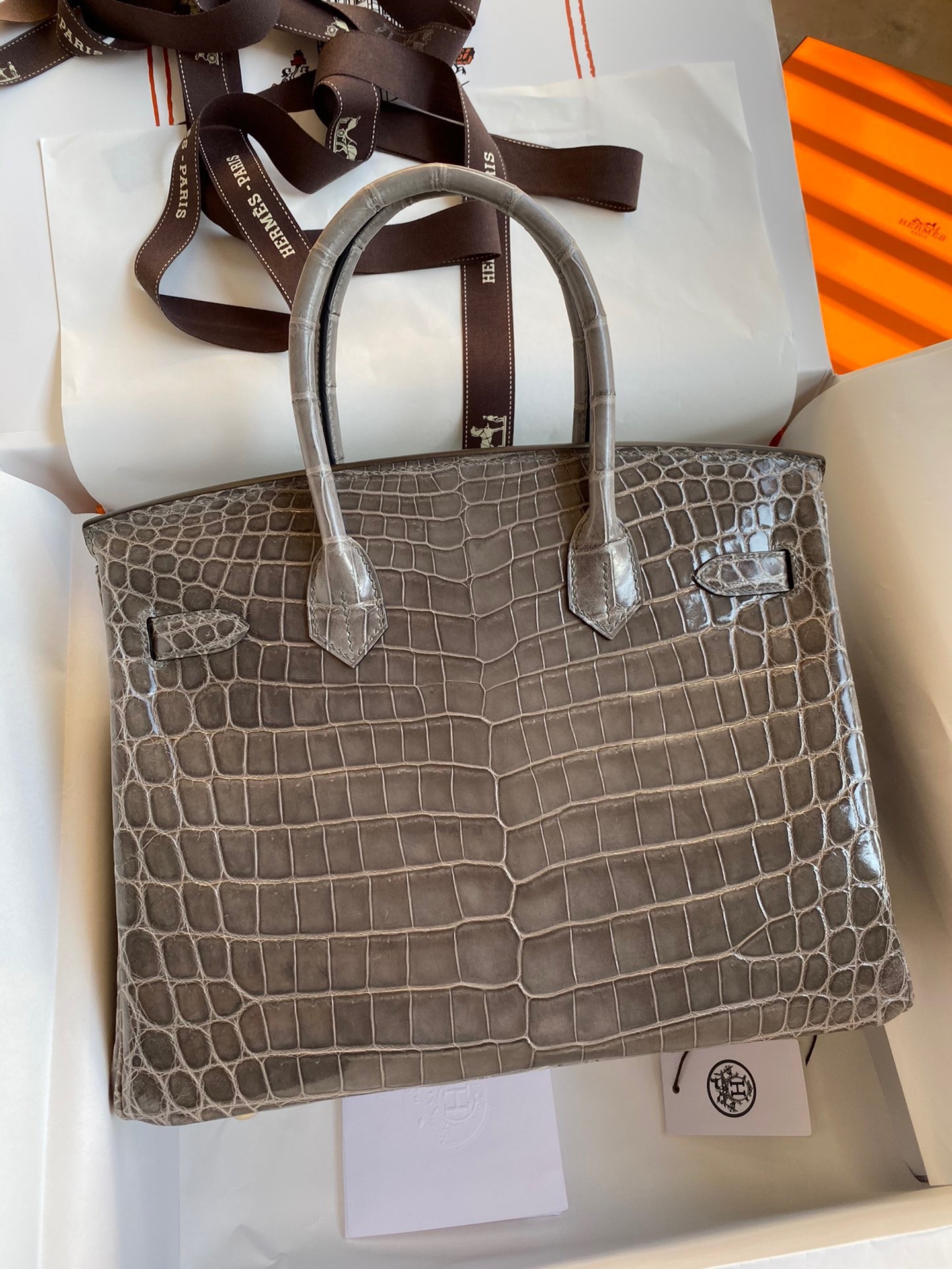 H**mes birkin 30 handmade bag in gris tourterelle crocodile niloticus shiny skin