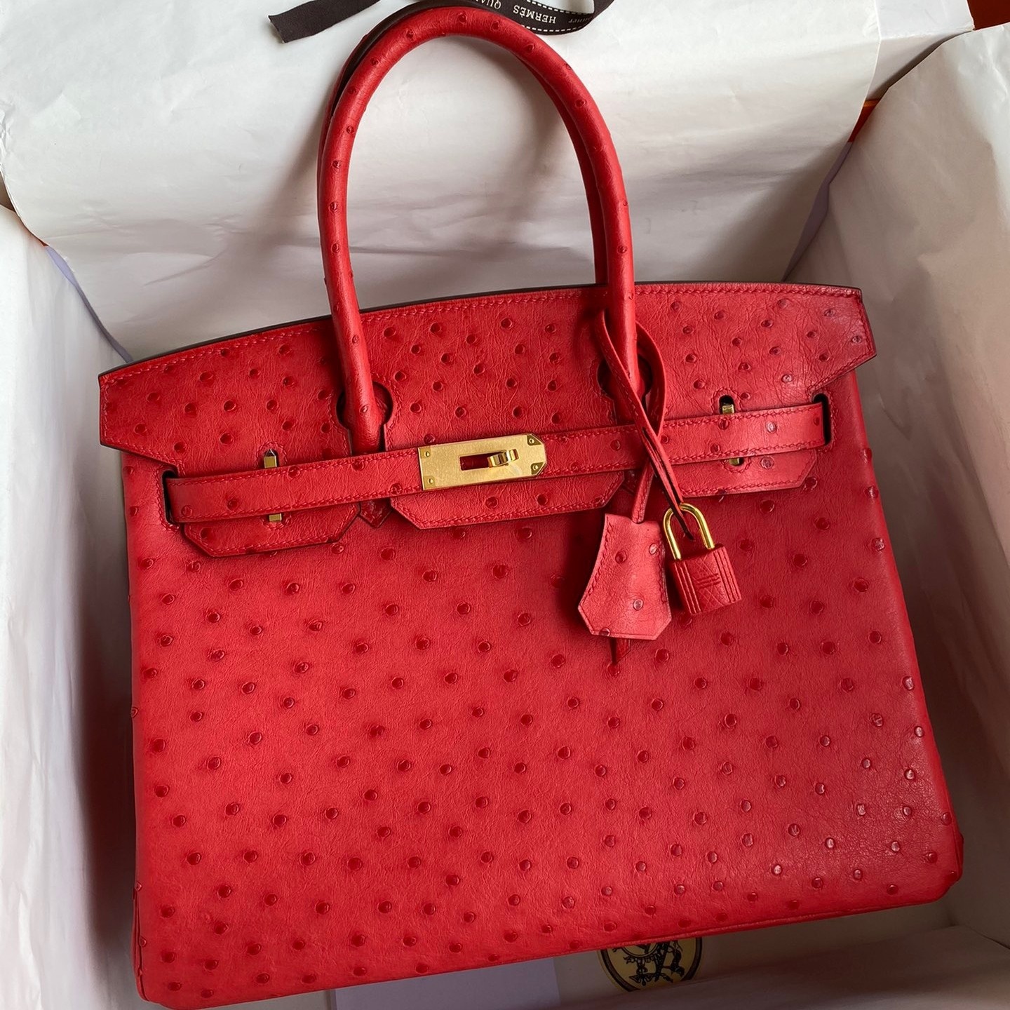 H**mes birkin 30 retourne handmade bag in red ostrich leather