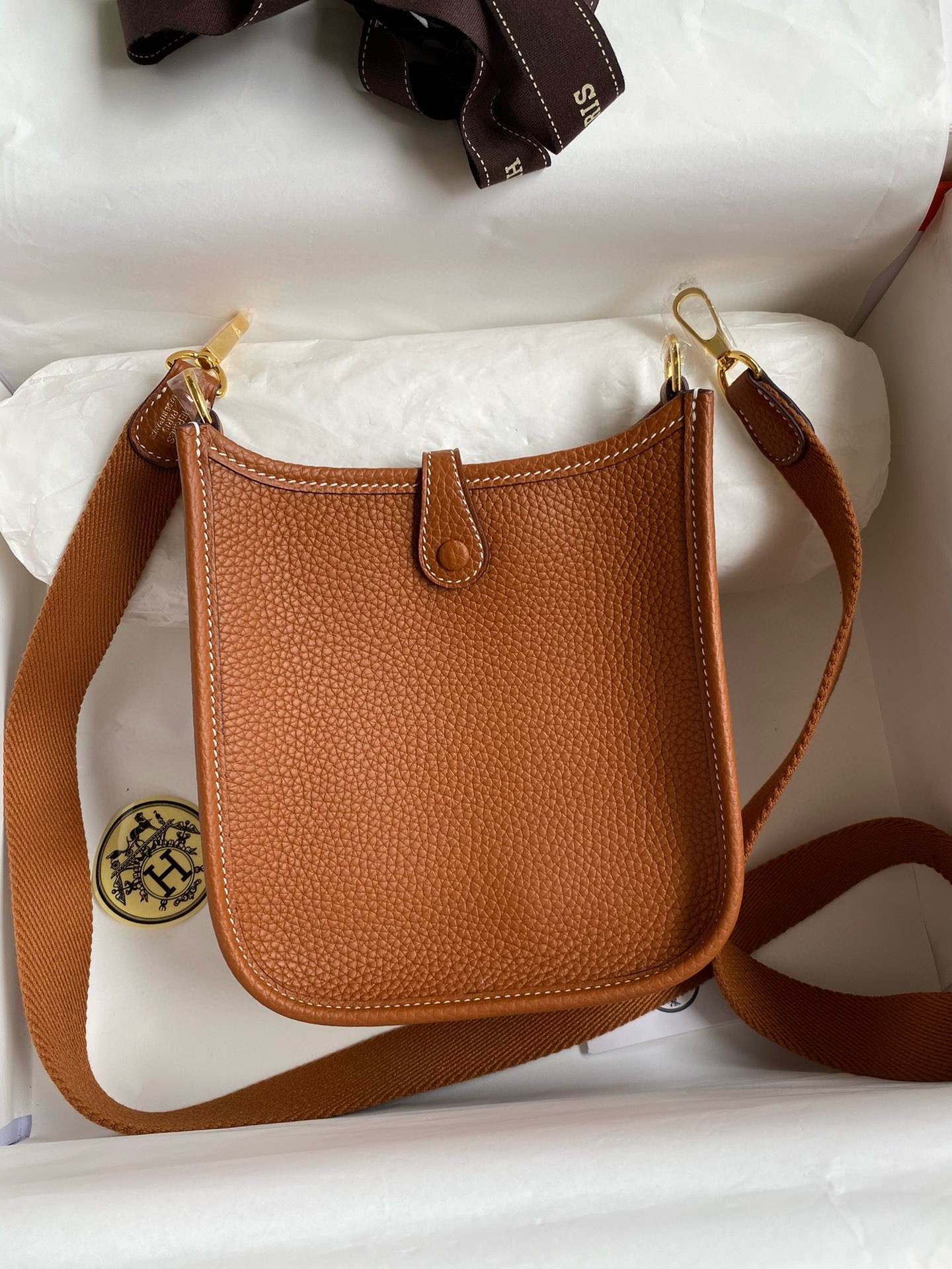 H**mes evelyne mini handmade bag in gold clemence leather
