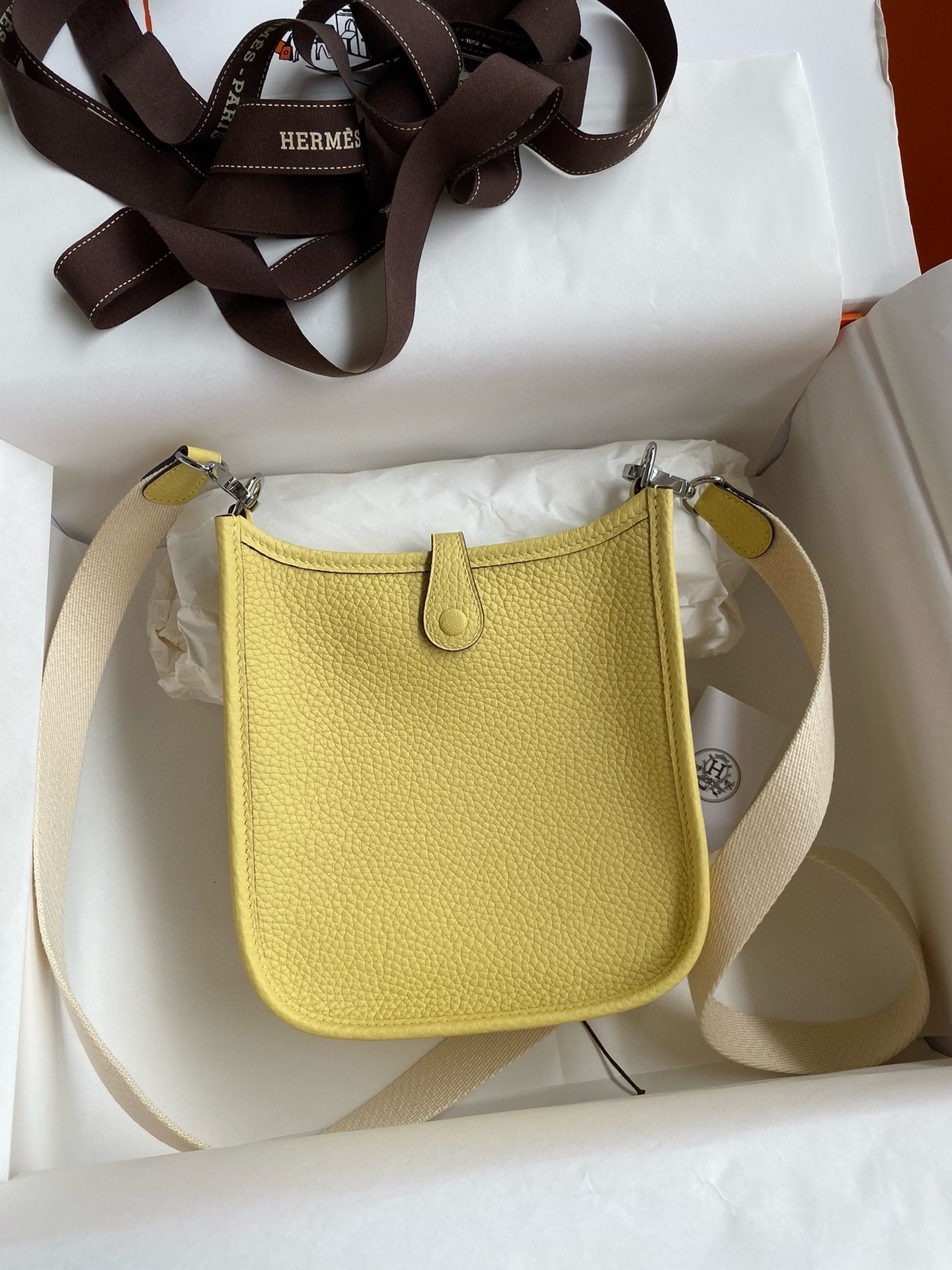 H**mes evelyne mini handmade bag in jaune poussin clemence leather