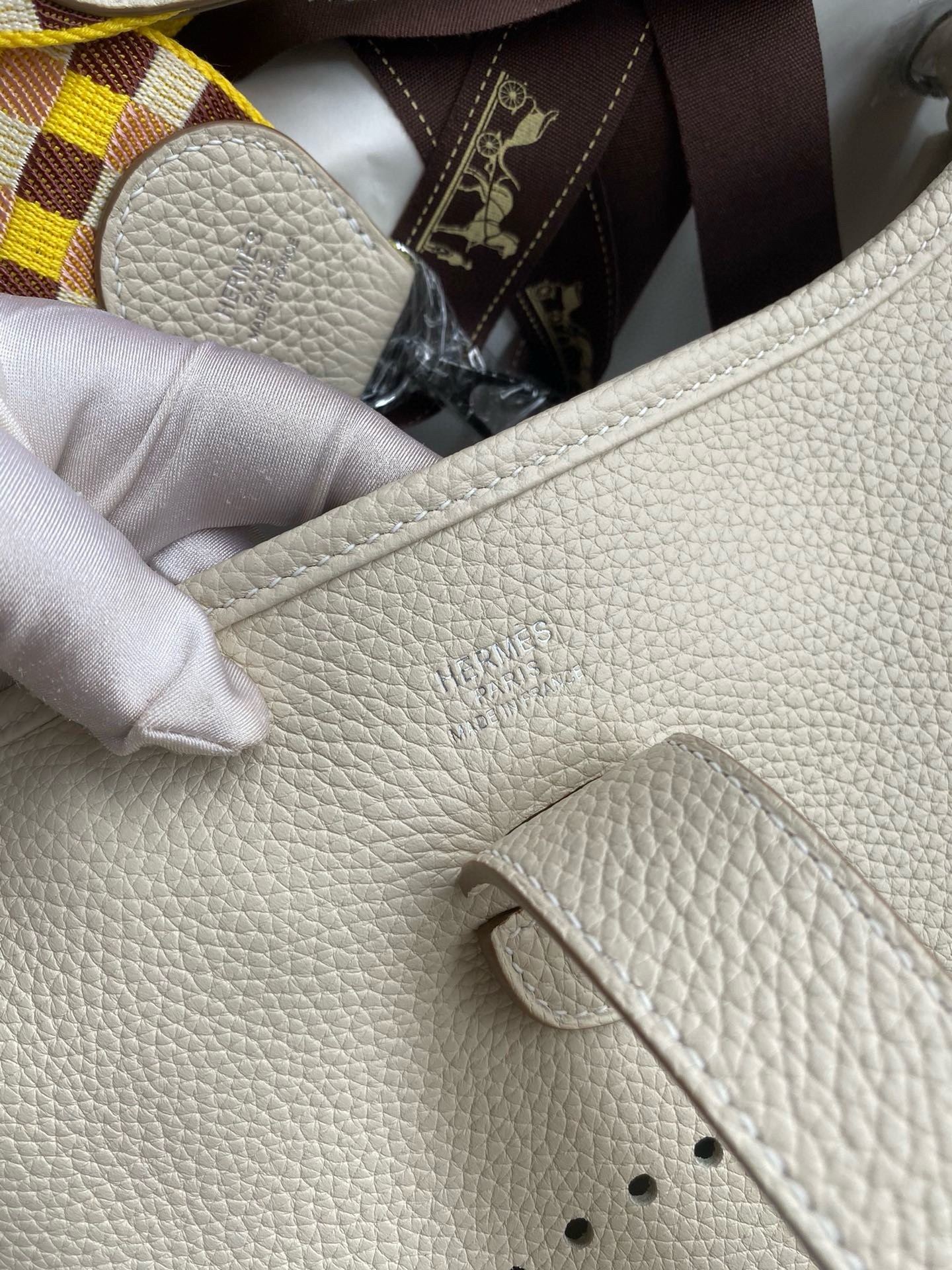 H**mes evelyne iii pm 29 handmade bag in craie clemence leather