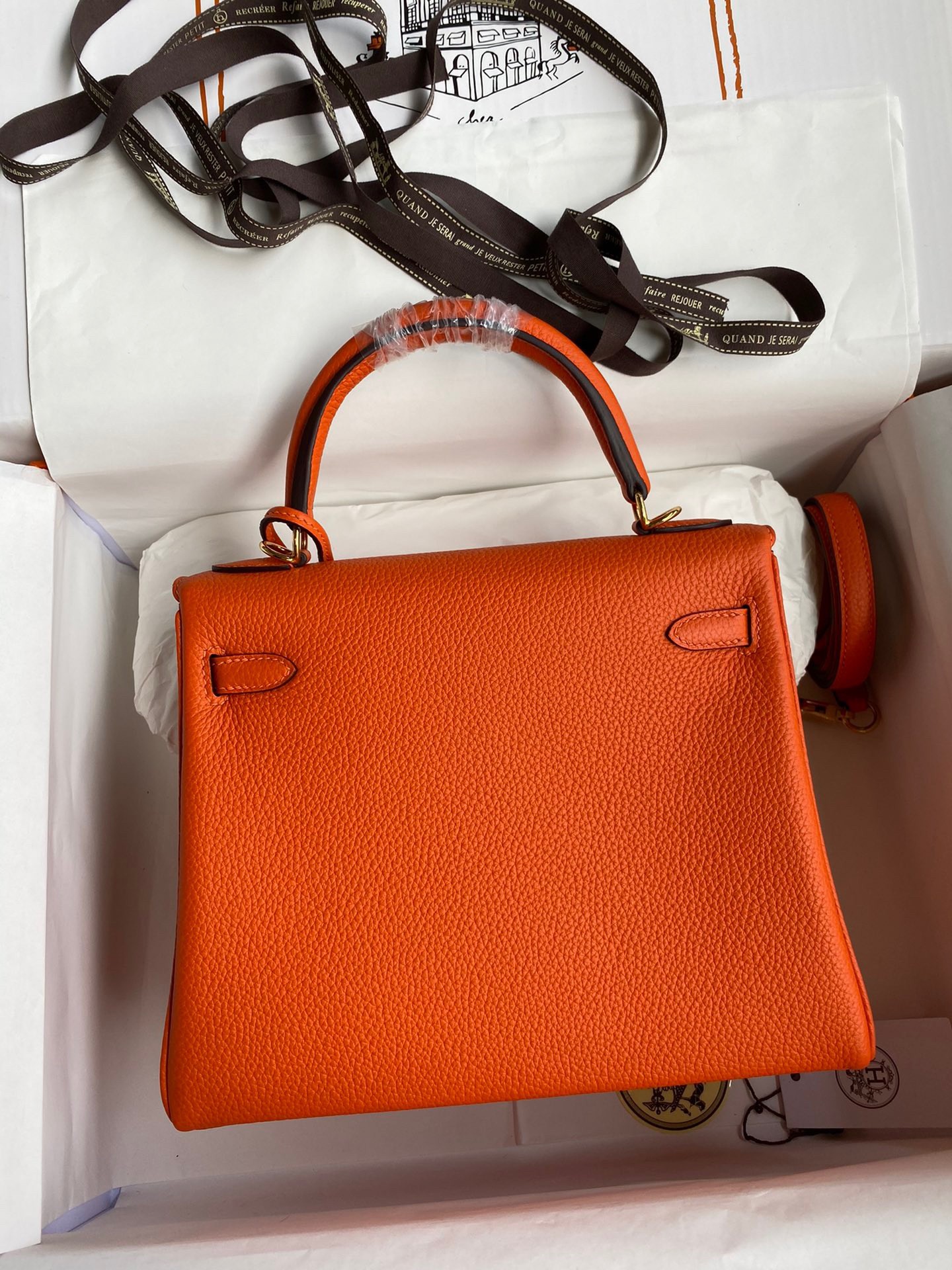 H**mes kelly retourne 25 handmade bag in orange clemence leather