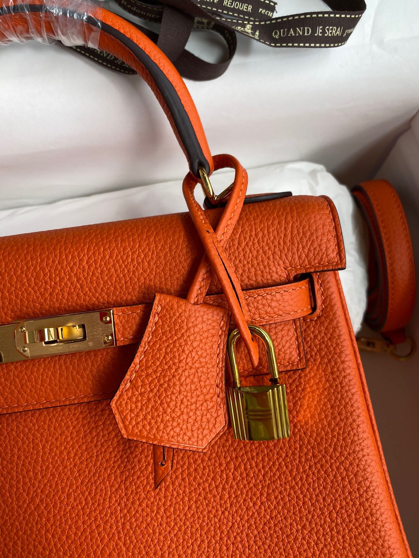 H**mes kelly retourne 25 handmade bag in orange clemence leather