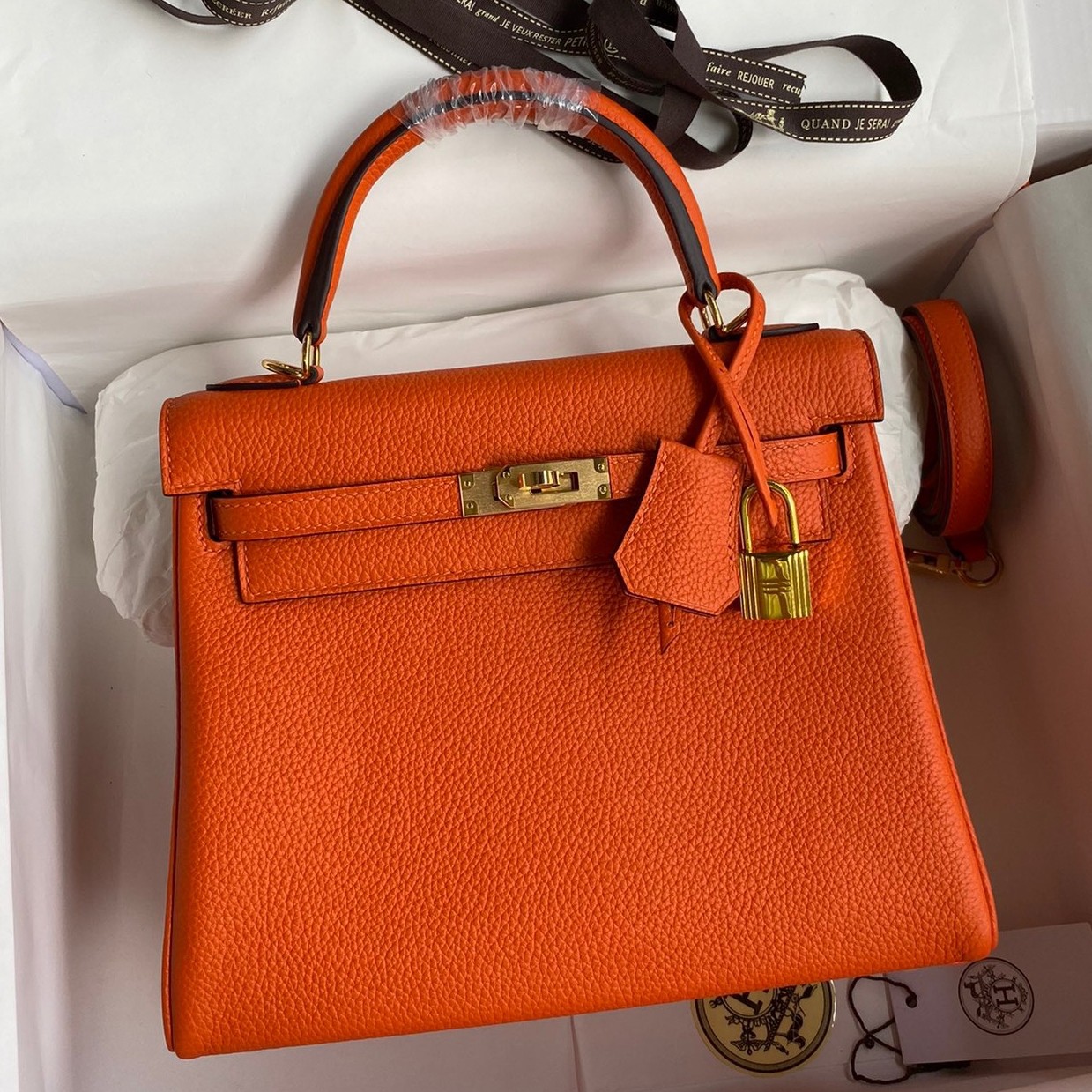 H**mes kelly retourne 25 handmade bag in orange clemence leather