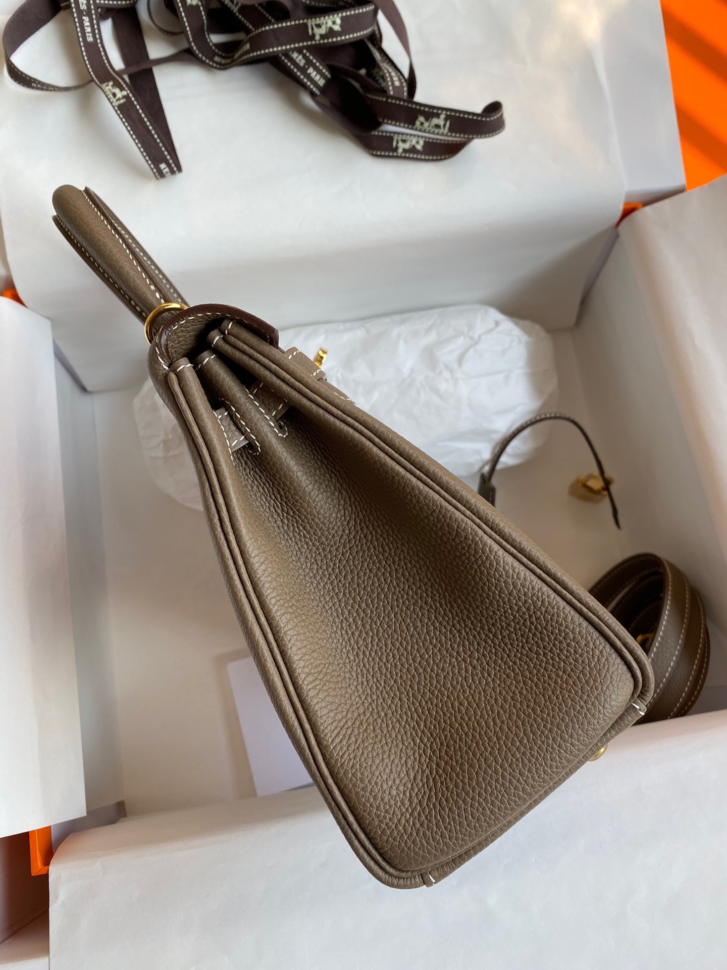 H**mes kelly retourne 25 handmade bag in taupe clemence leather