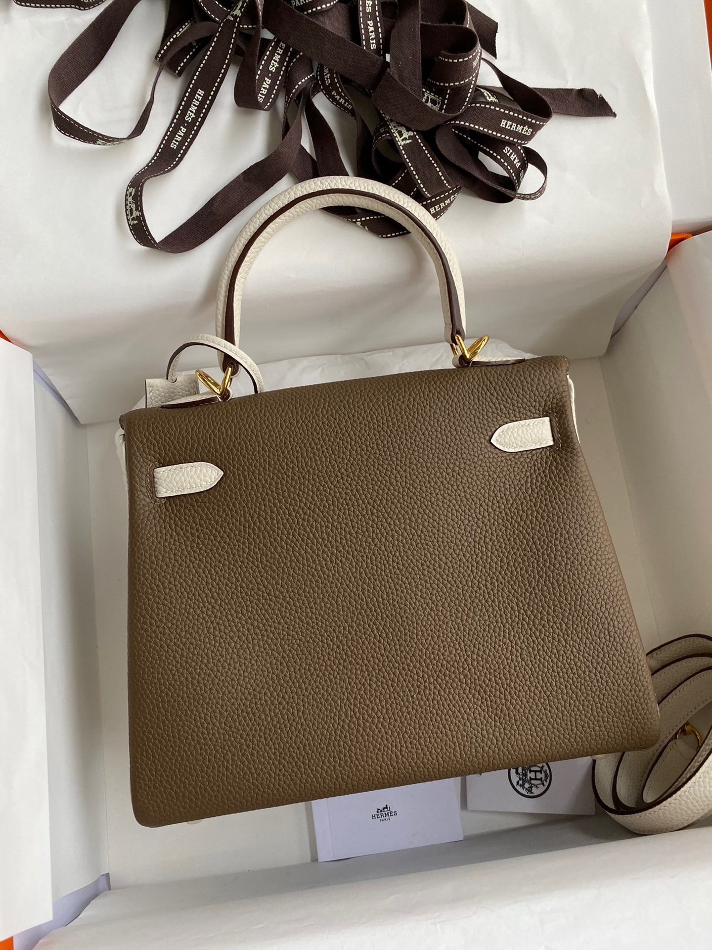 H**mes kelly retourne 25 bicolor bag in taupe and craie clemence calfskin