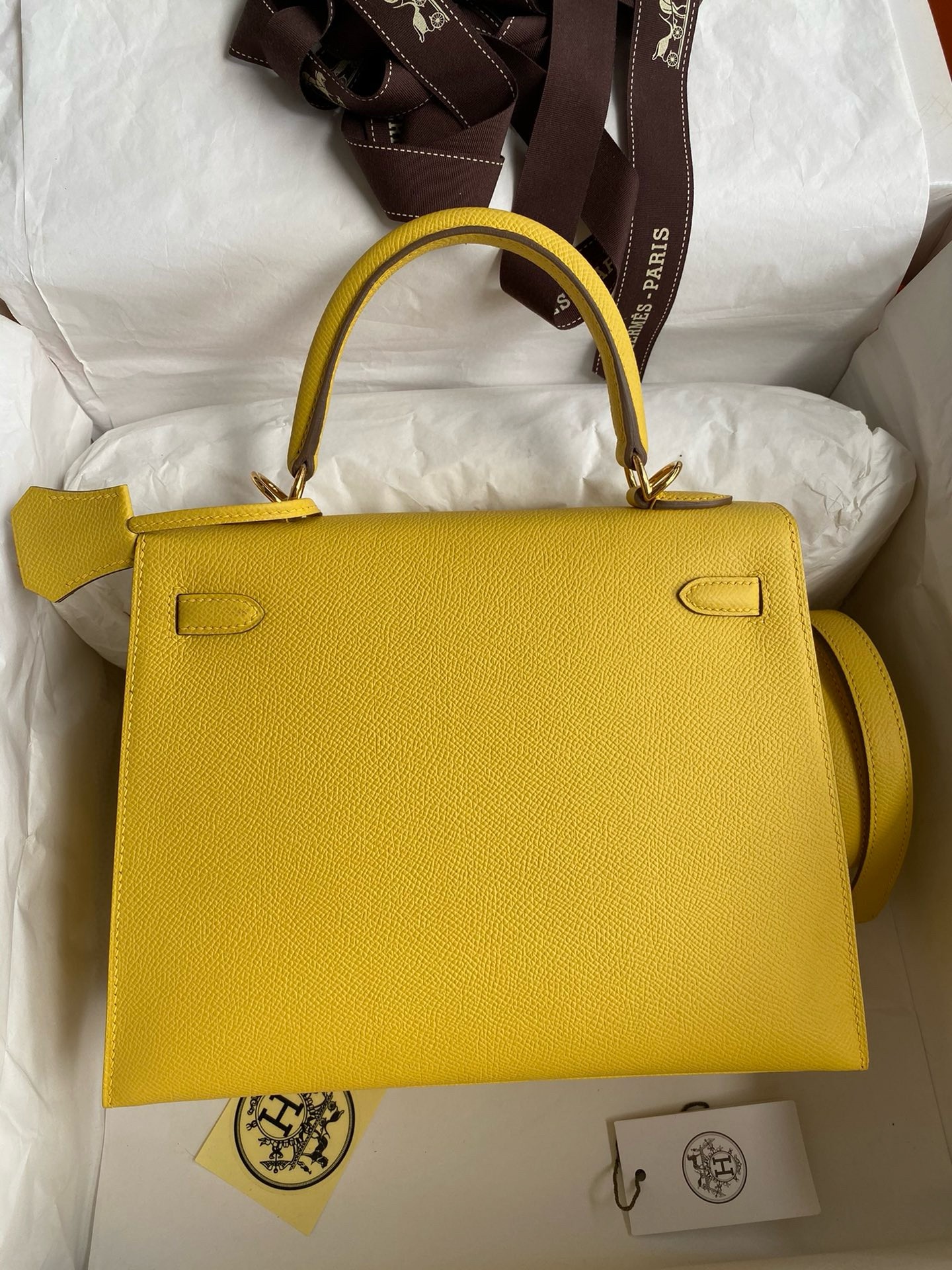 H**mes kelly sellier 25 handmade bag in jaune de naples epsom calfskin