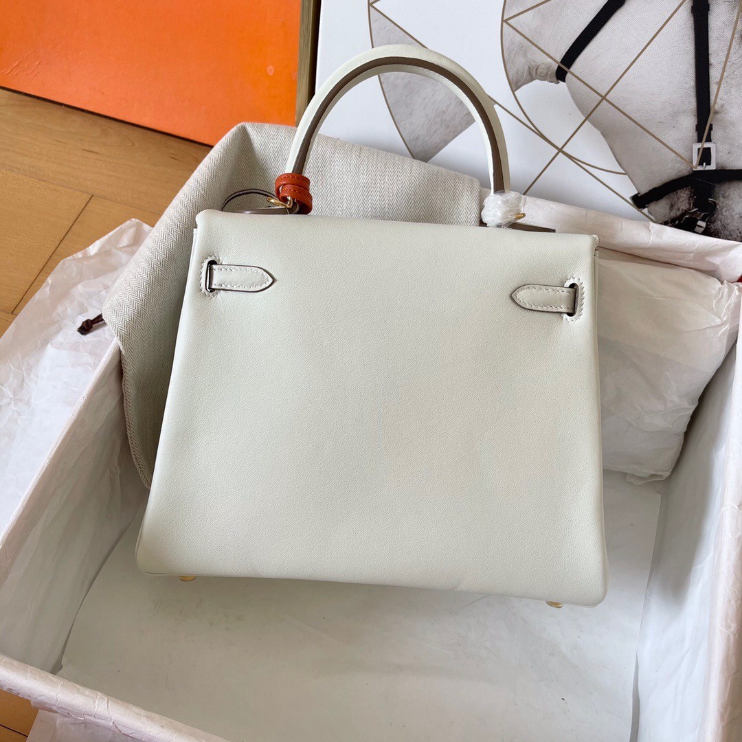 H**mes kelly retourne 25 handmade bag in craie swift calfskin