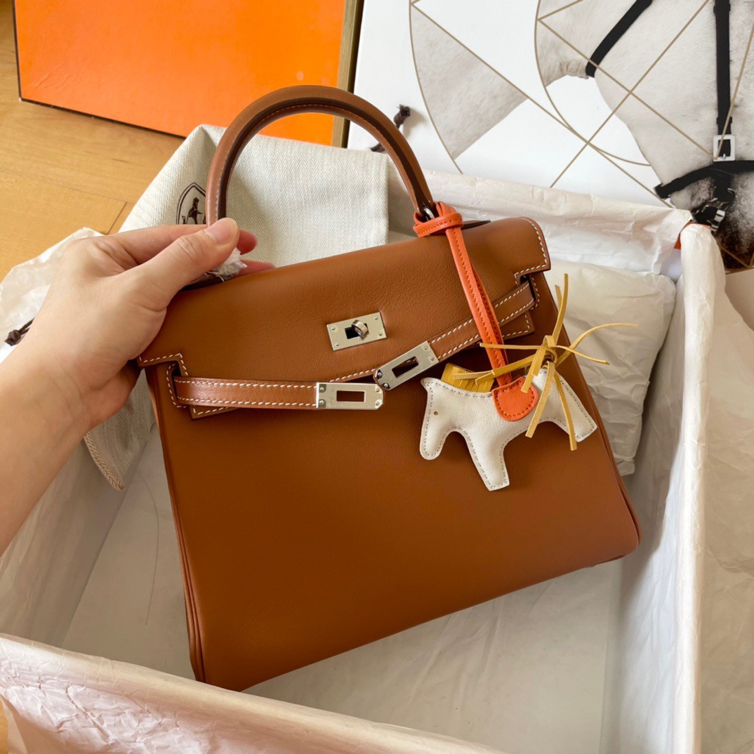 H**mes kelly retourne 25 handmade bag in gold swift calfskin