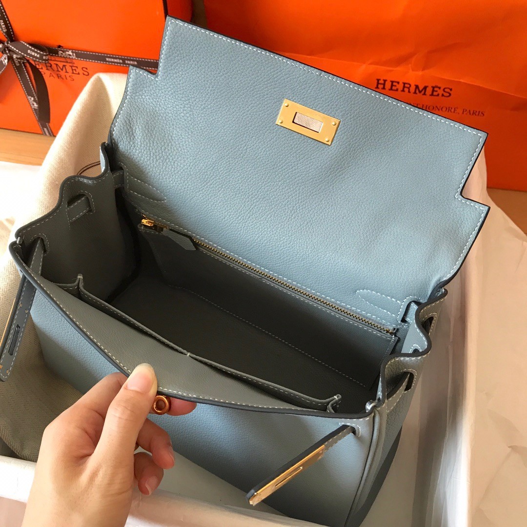 H**mes kelly retourne 28 handmade bag in blue lin clemence leather