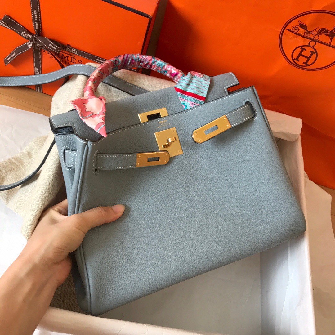 H**mes kelly retourne 28 handmade bag in blue lin clemence leather