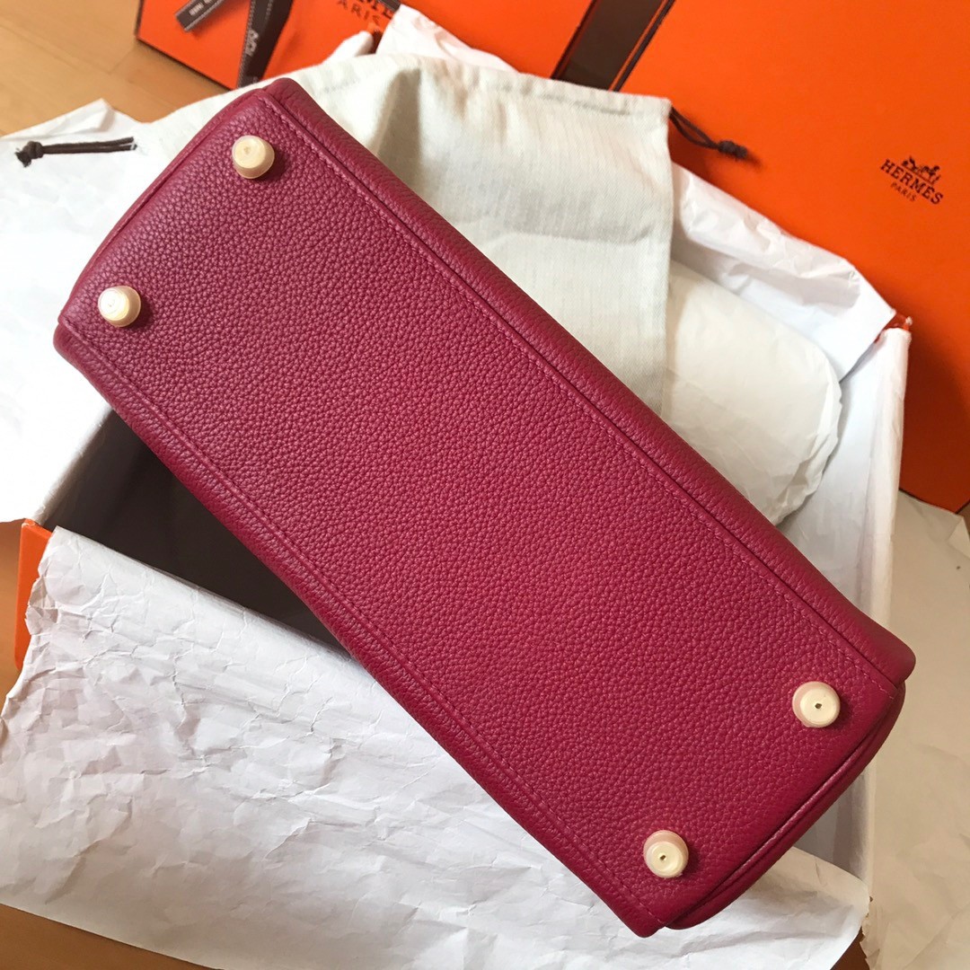 H**mes kelly retourne 28 handmade bag in ruby clemence leather