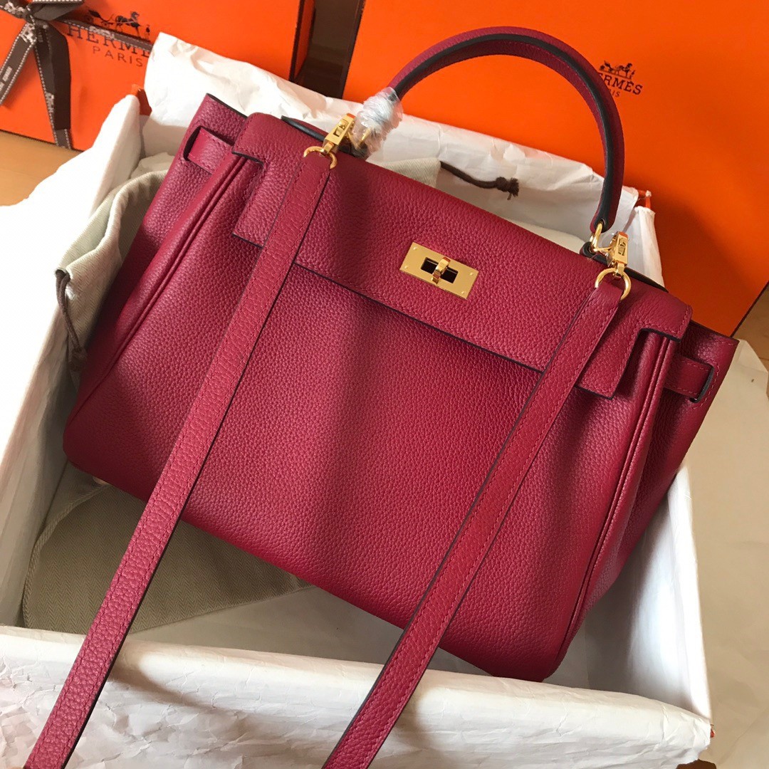 H**mes kelly retourne 28 handmade bag in ruby clemence leather