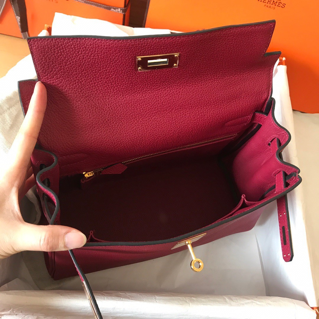 H**mes kelly retourne 28 handmade bag in ruby clemence leather