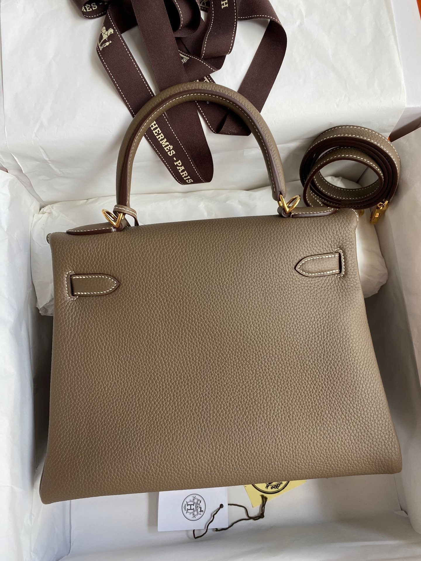 H**mes kelly retourne 28 handmade bag in taupe clemence leather