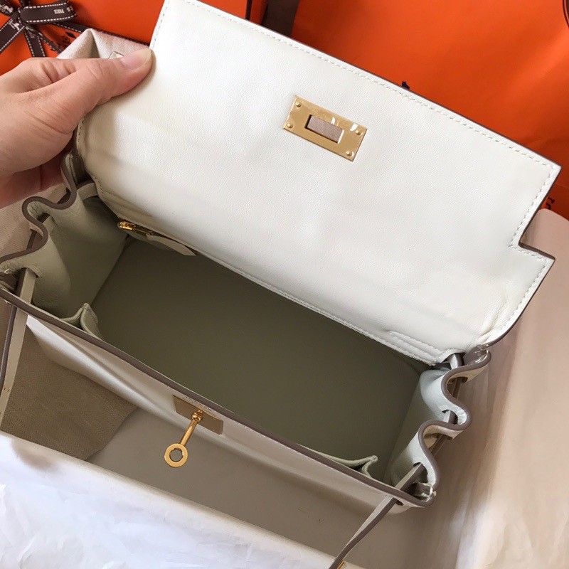 H**mes kelly retourne 28 handmade bag in craie swift calfskin