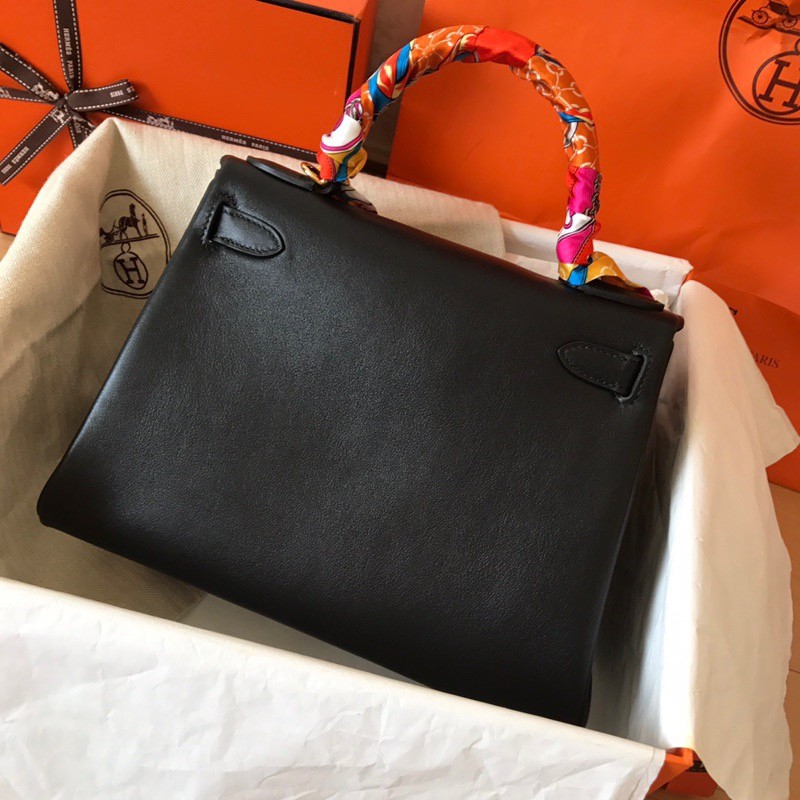 H**mes kelly retourne 28 handmade bag in black swift calfskin