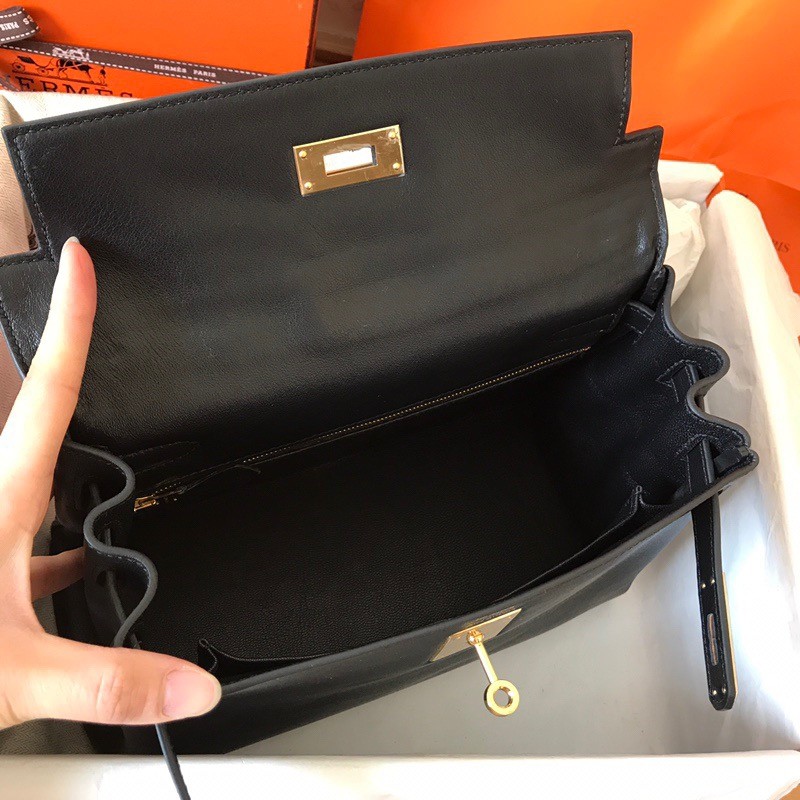H**mes kelly retourne 28 handmade bag in black swift calfskin