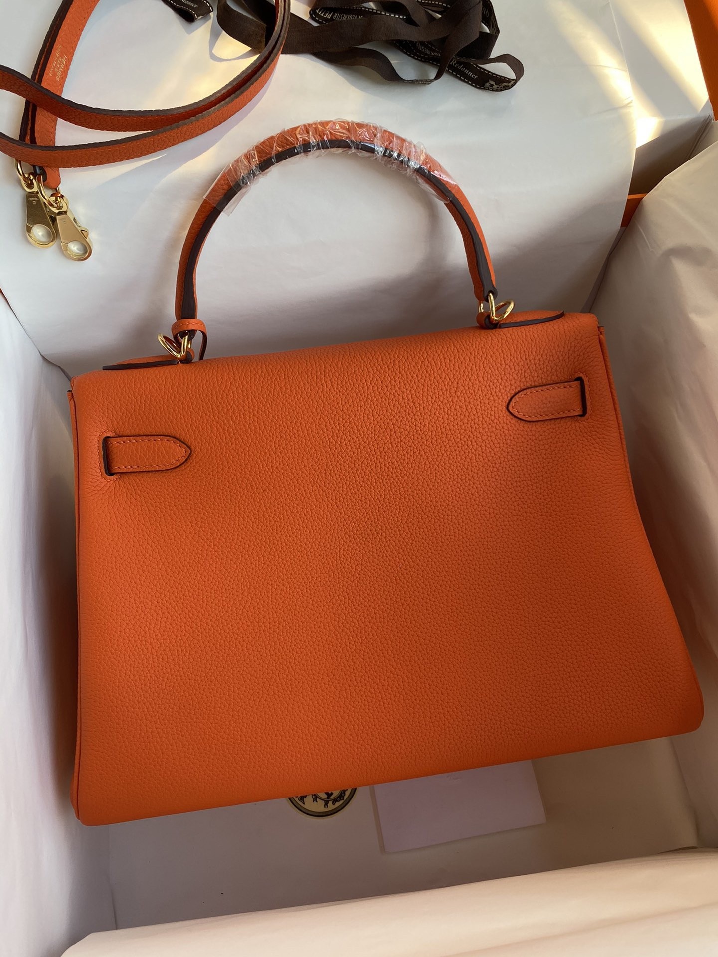H**mes kelly retourne 32 handmade bag in orange clemence leather