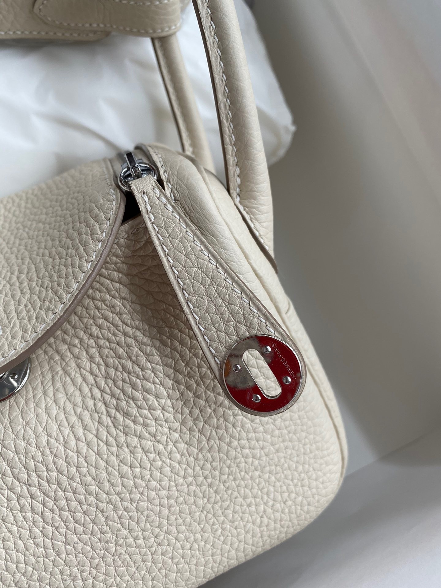 H**mes mini lindy handmade bag in craie clemence leather