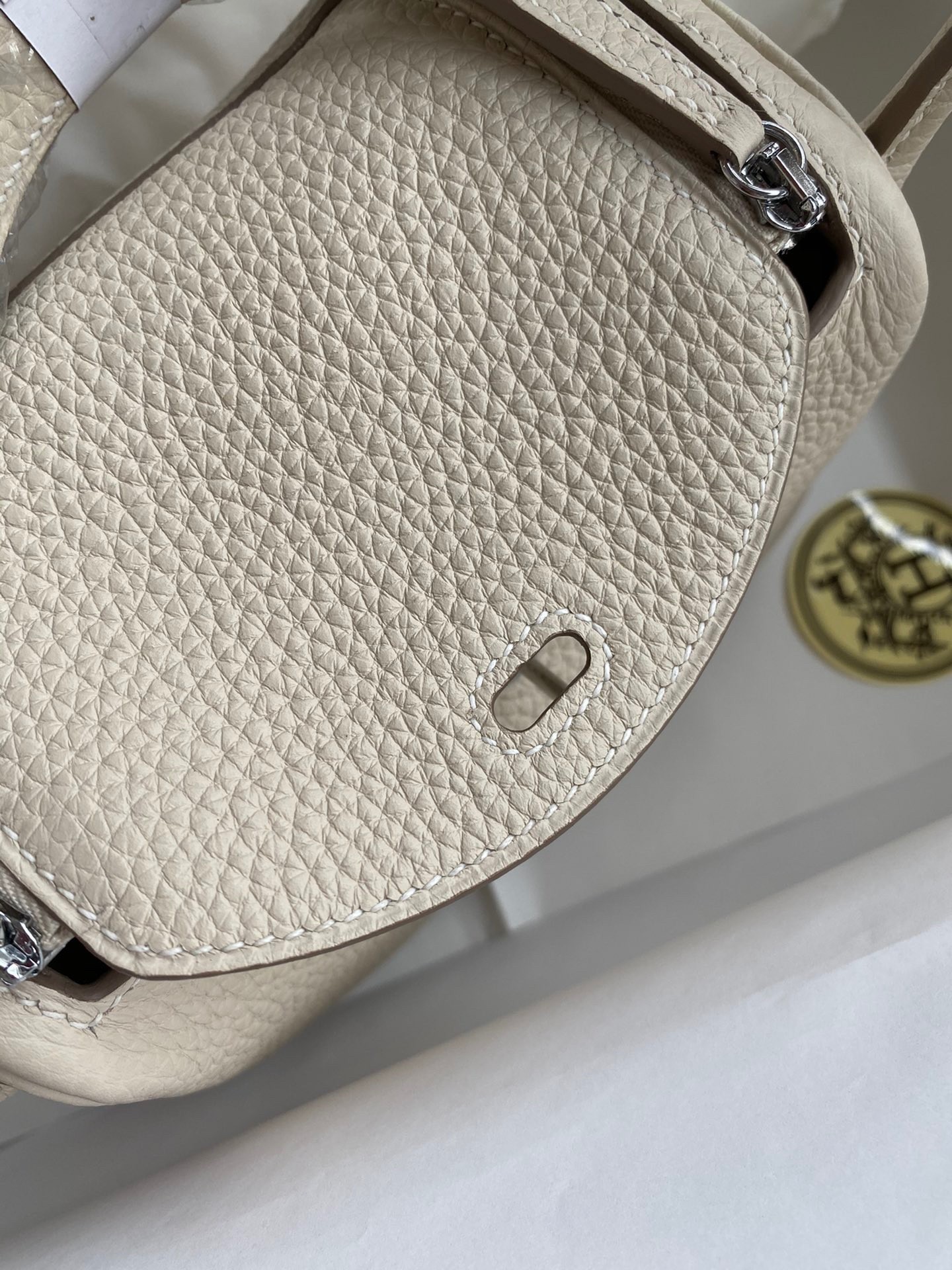 H**mes mini lindy handmade bag in craie clemence leather