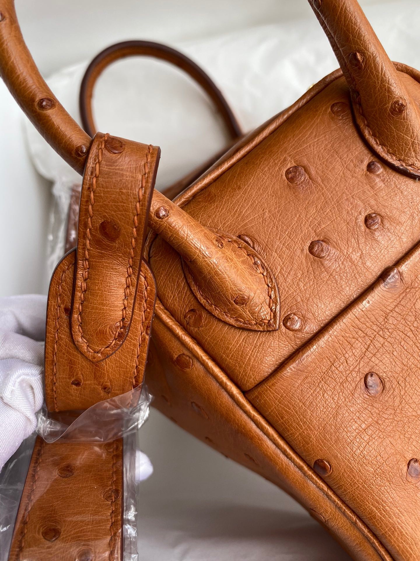 H**mes mini lindy handmade bag in gold ostrich leather