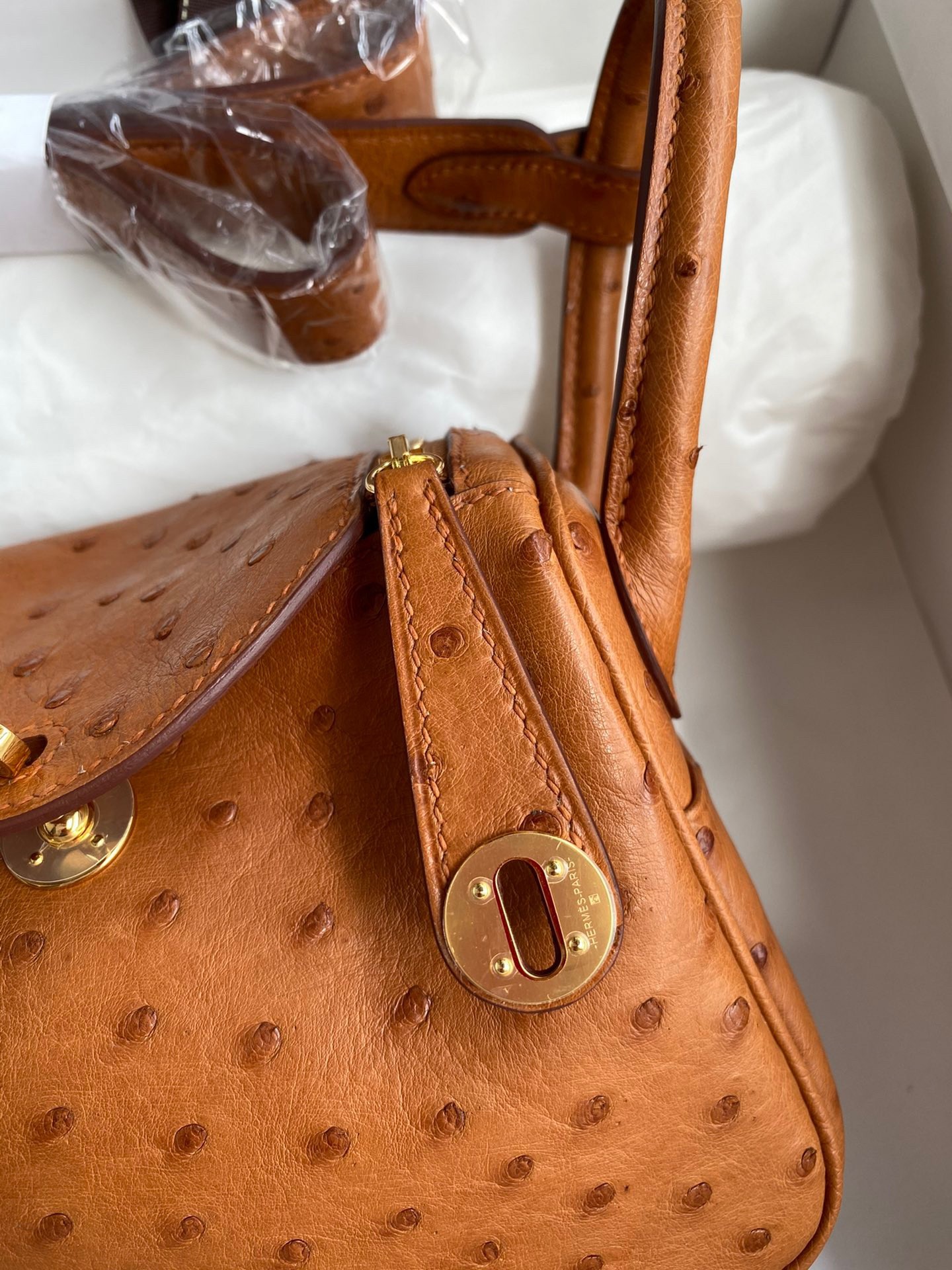 H**mes mini lindy handmade bag in gold ostrich leather