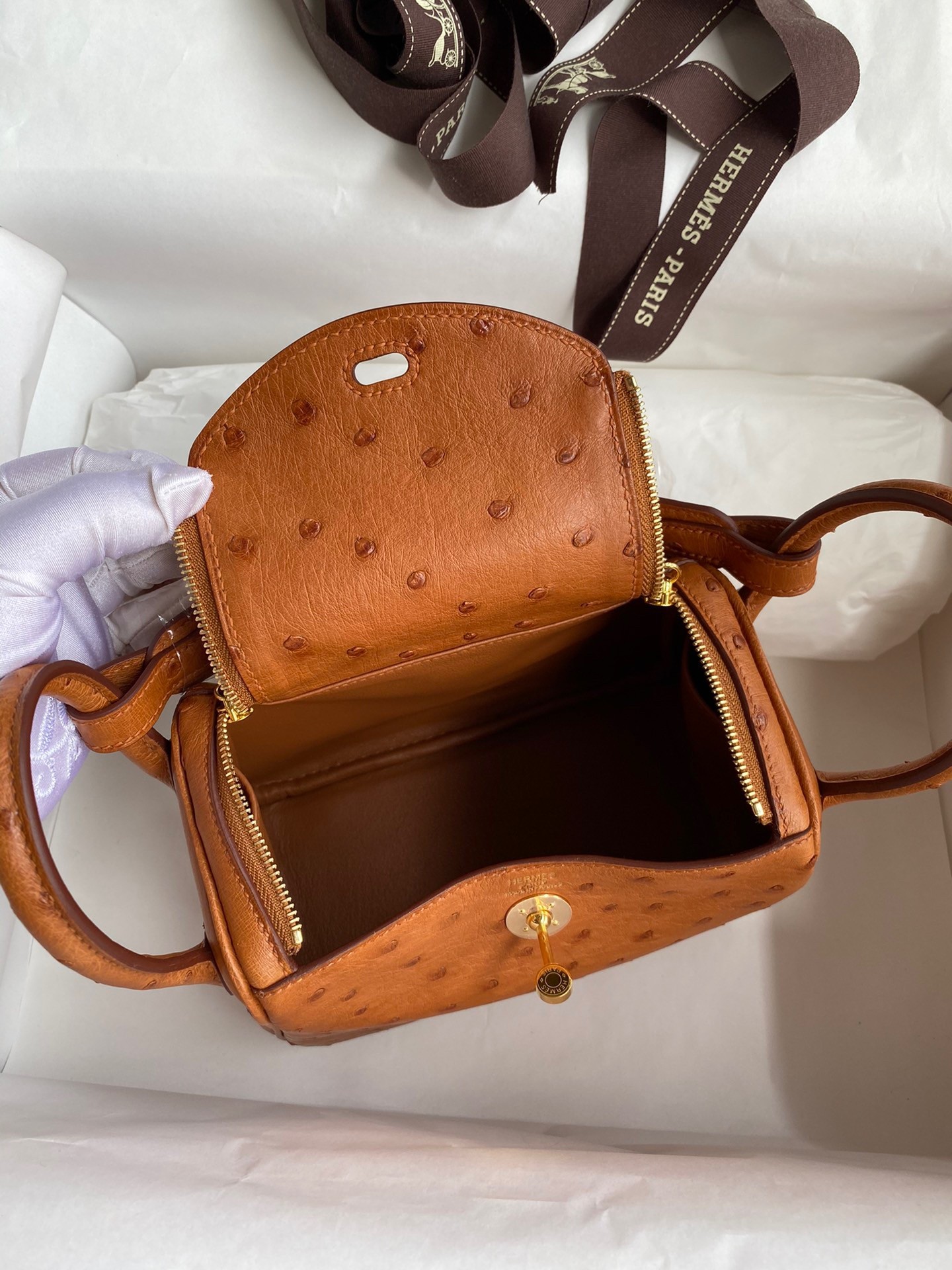 H**mes mini lindy handmade bag in gold ostrich leather