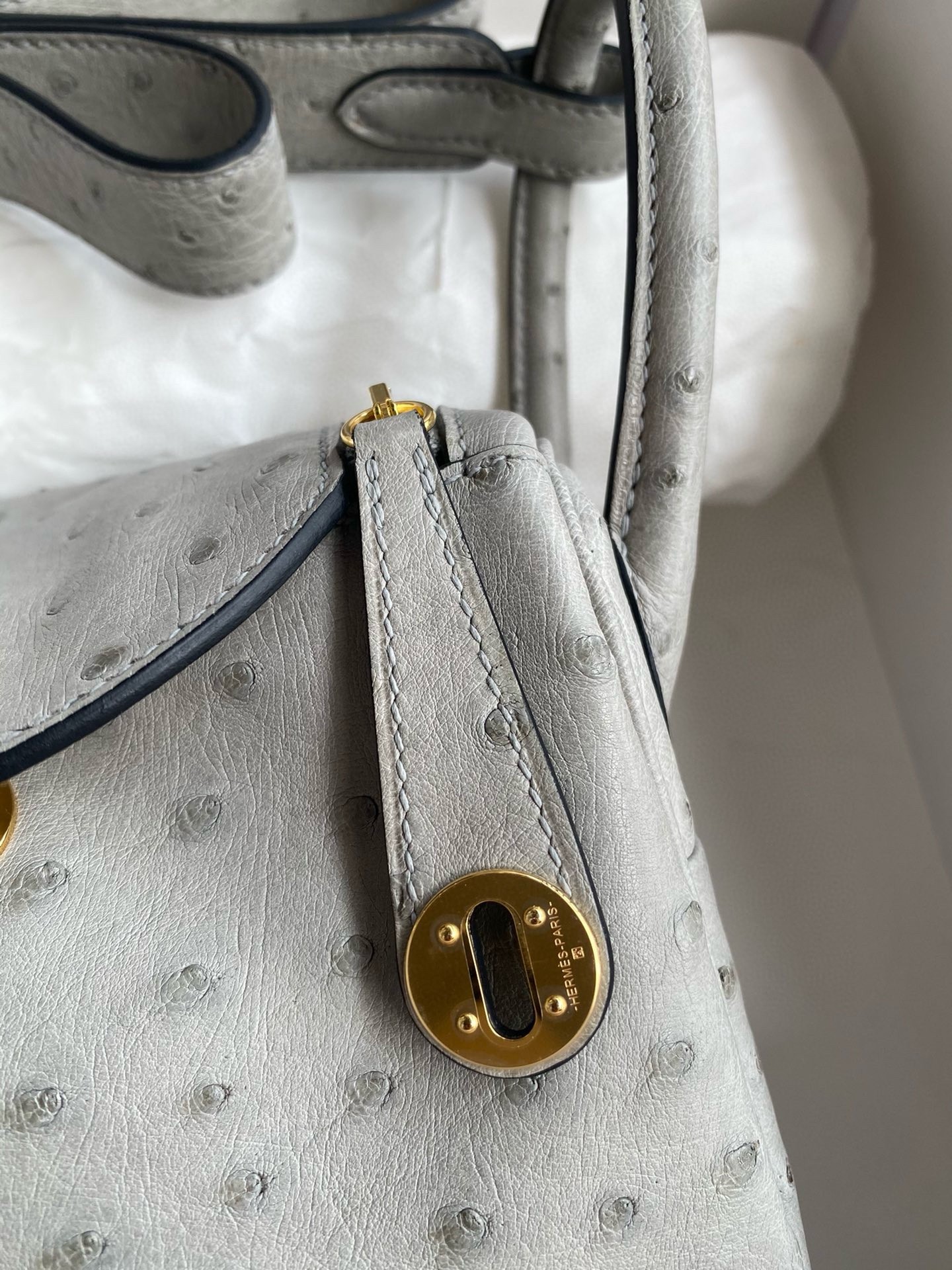 H**mes mini lindy handmade bag in pearl grey ostrich leather