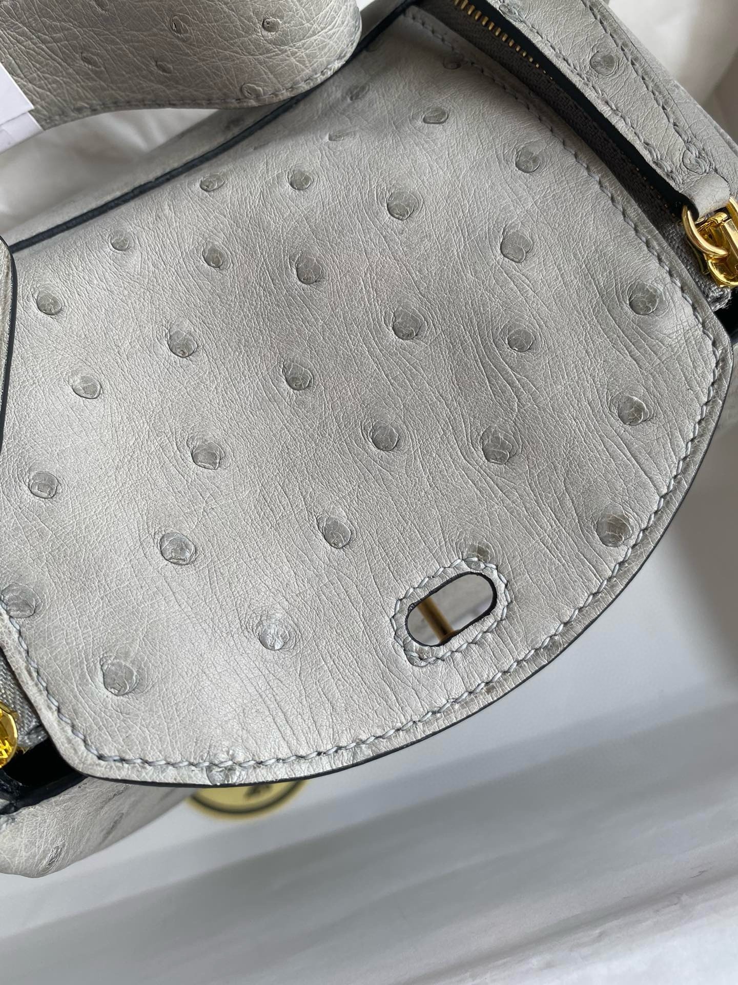 H**mes mini lindy handmade bag in pearl grey ostrich leather
