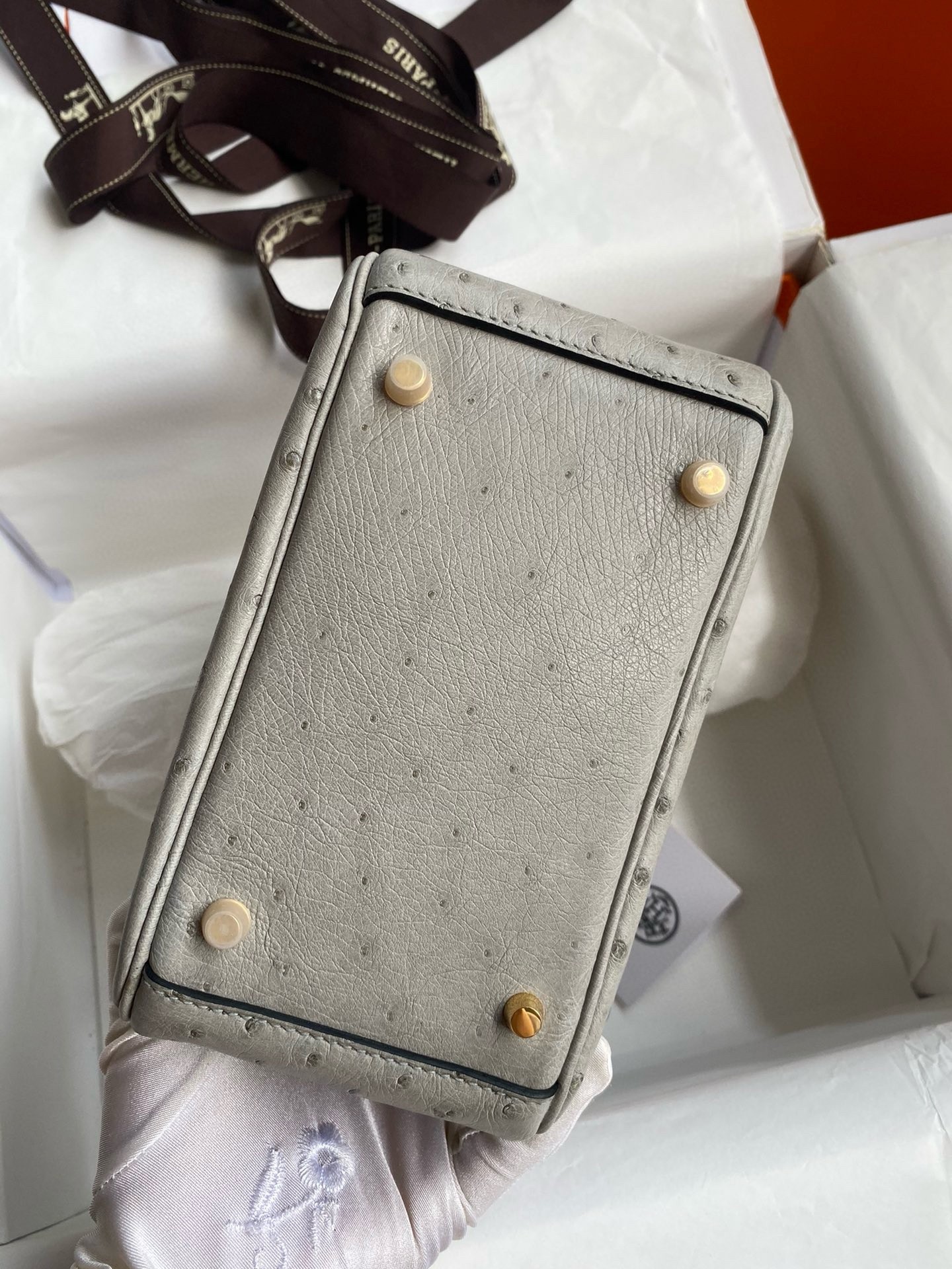 H**mes mini lindy handmade bag in pearl grey ostrich leather