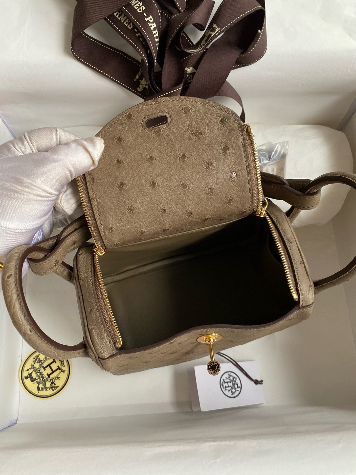 H**mes mini lindy handmade bag in taupe ostrich leather