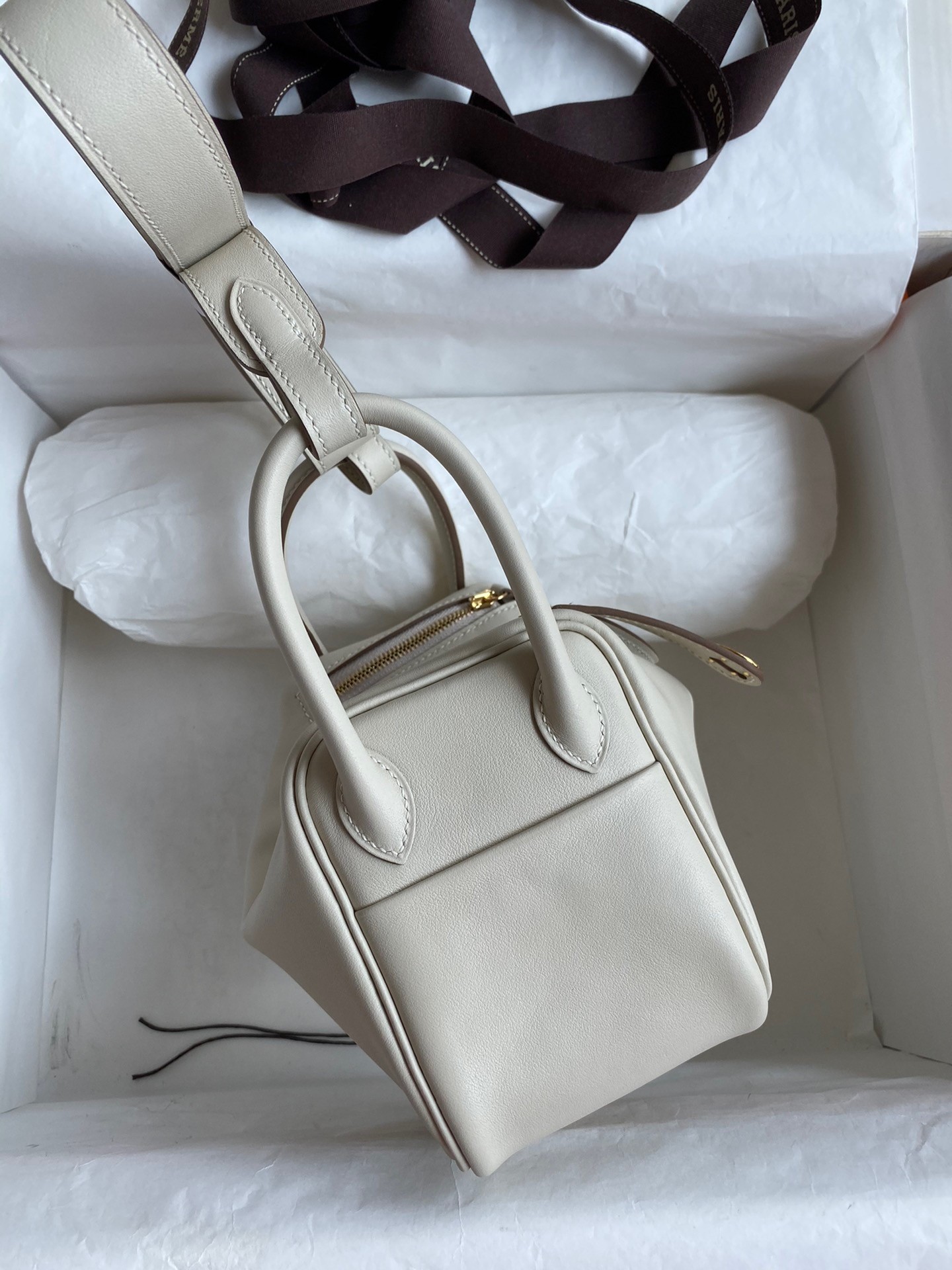 H**mes mini lindy handmade bag in craie swift leather