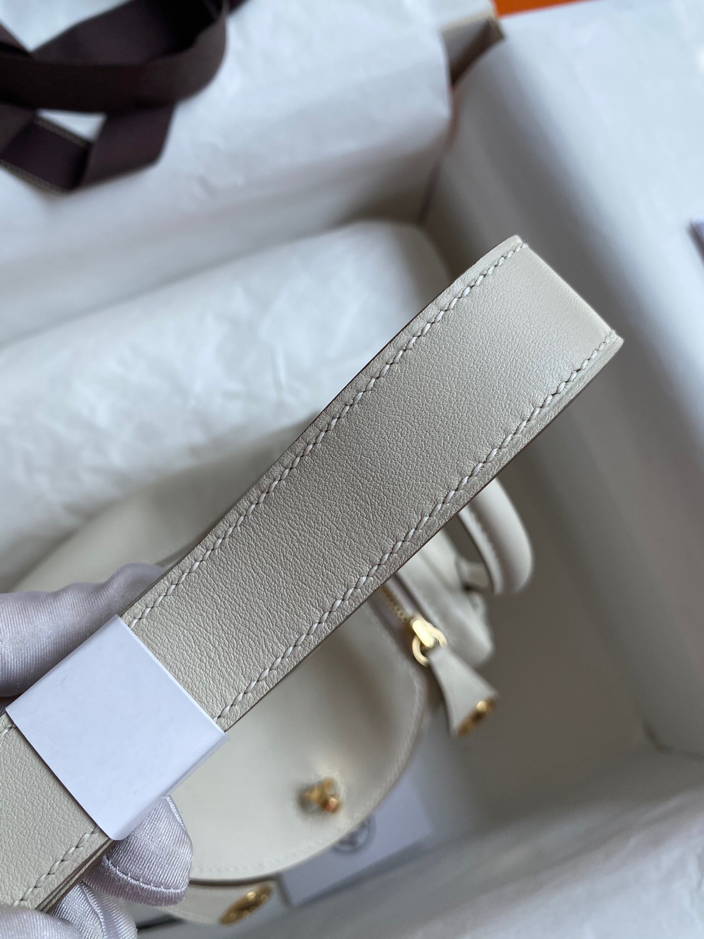 H**mes mini lindy handmade bag in craie swift leather