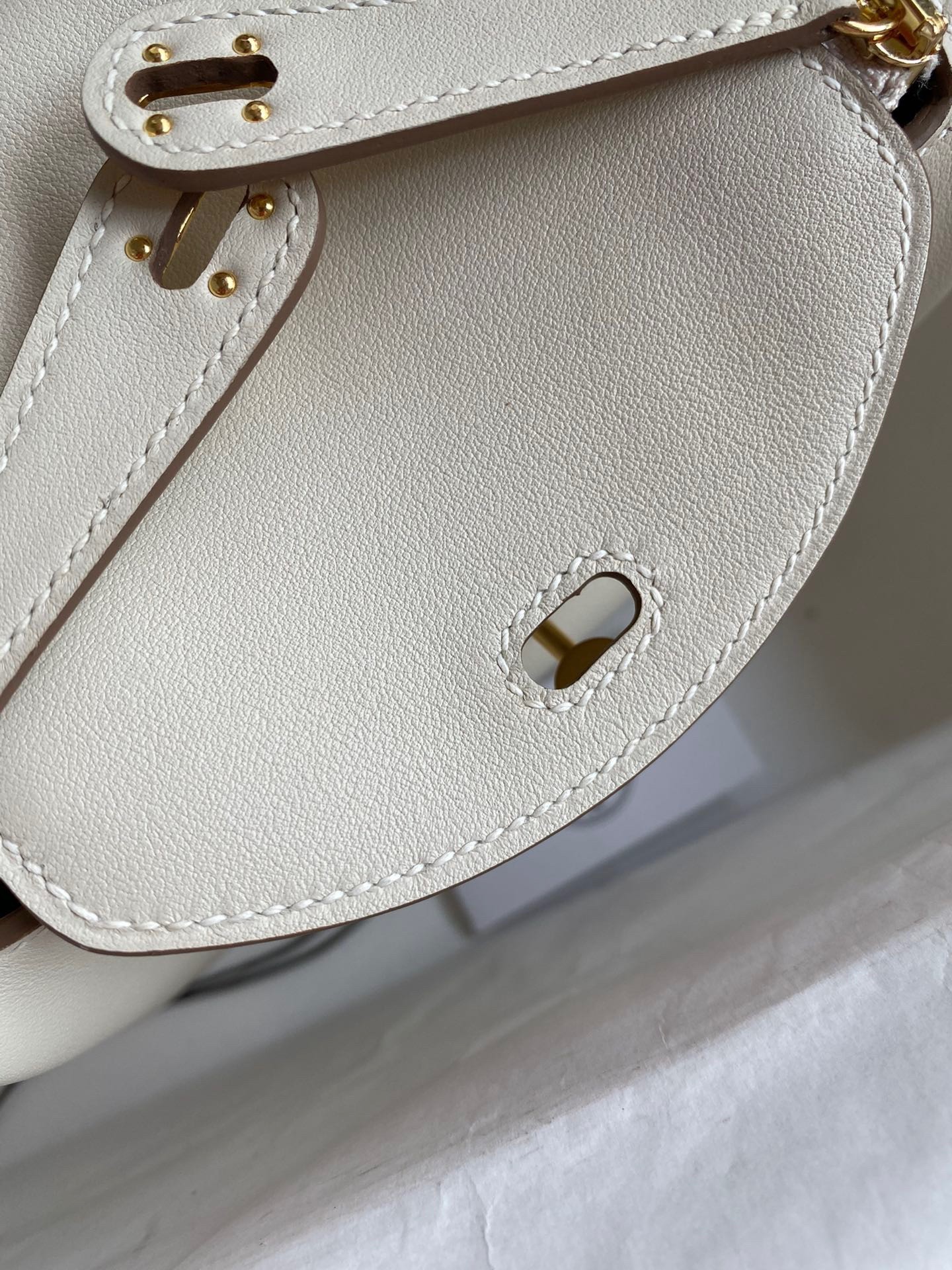 H**mes mini lindy handmade bag in craie swift leather