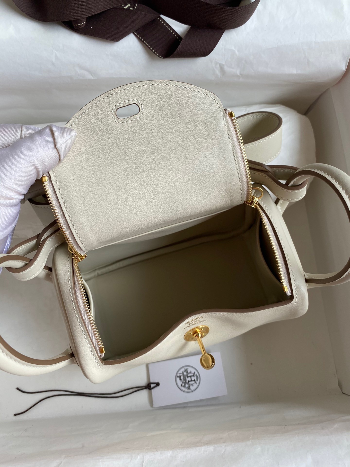 H**mes mini lindy handmade bag in craie swift leather