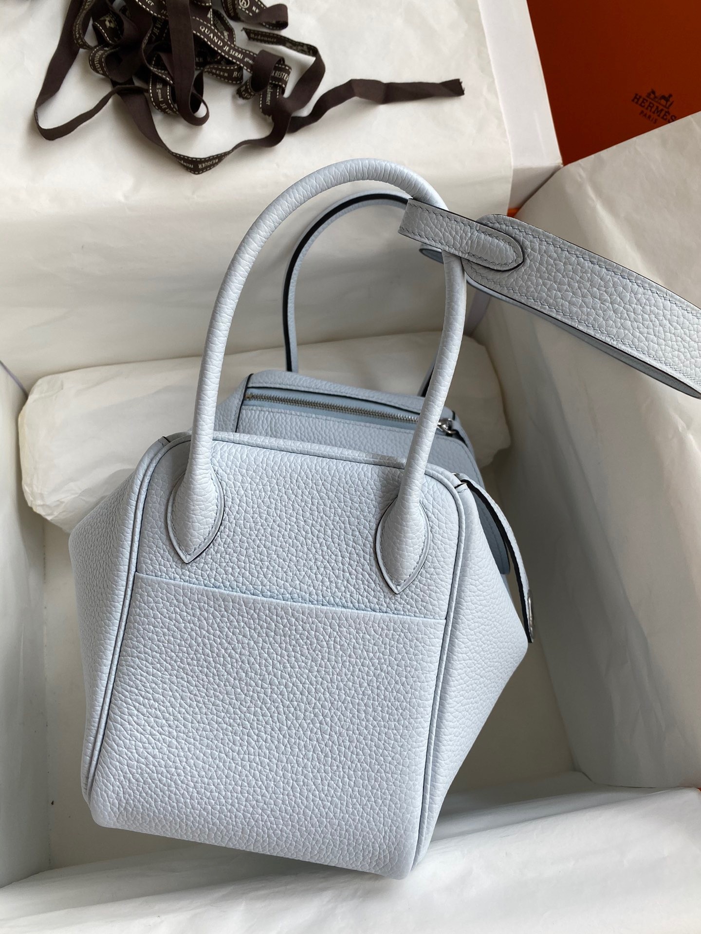 H**mes lindy 26 handmade bag in blue brume clemence leather