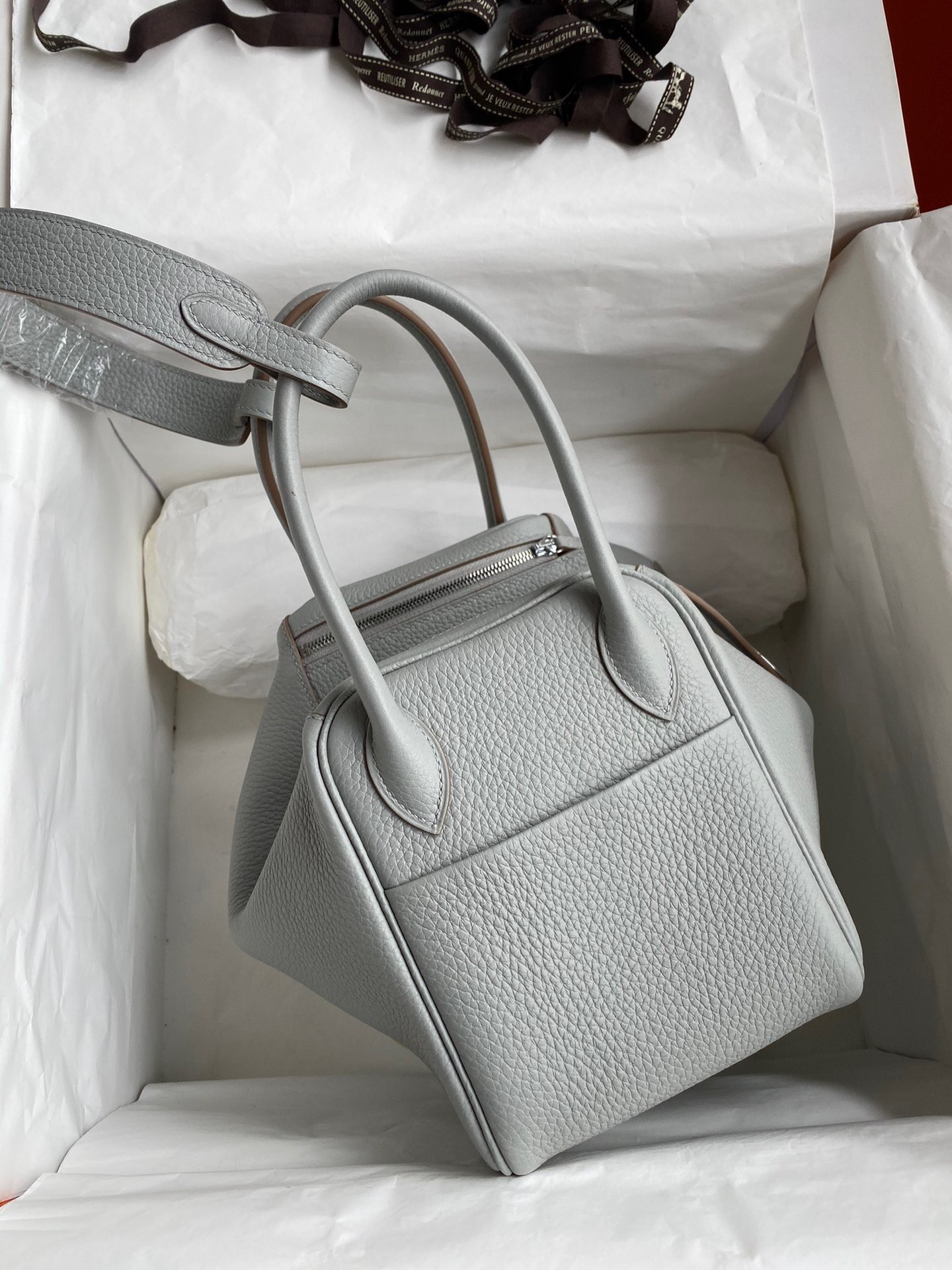 H**mes lindy 26 handmade bag in blue glacier clemence leather