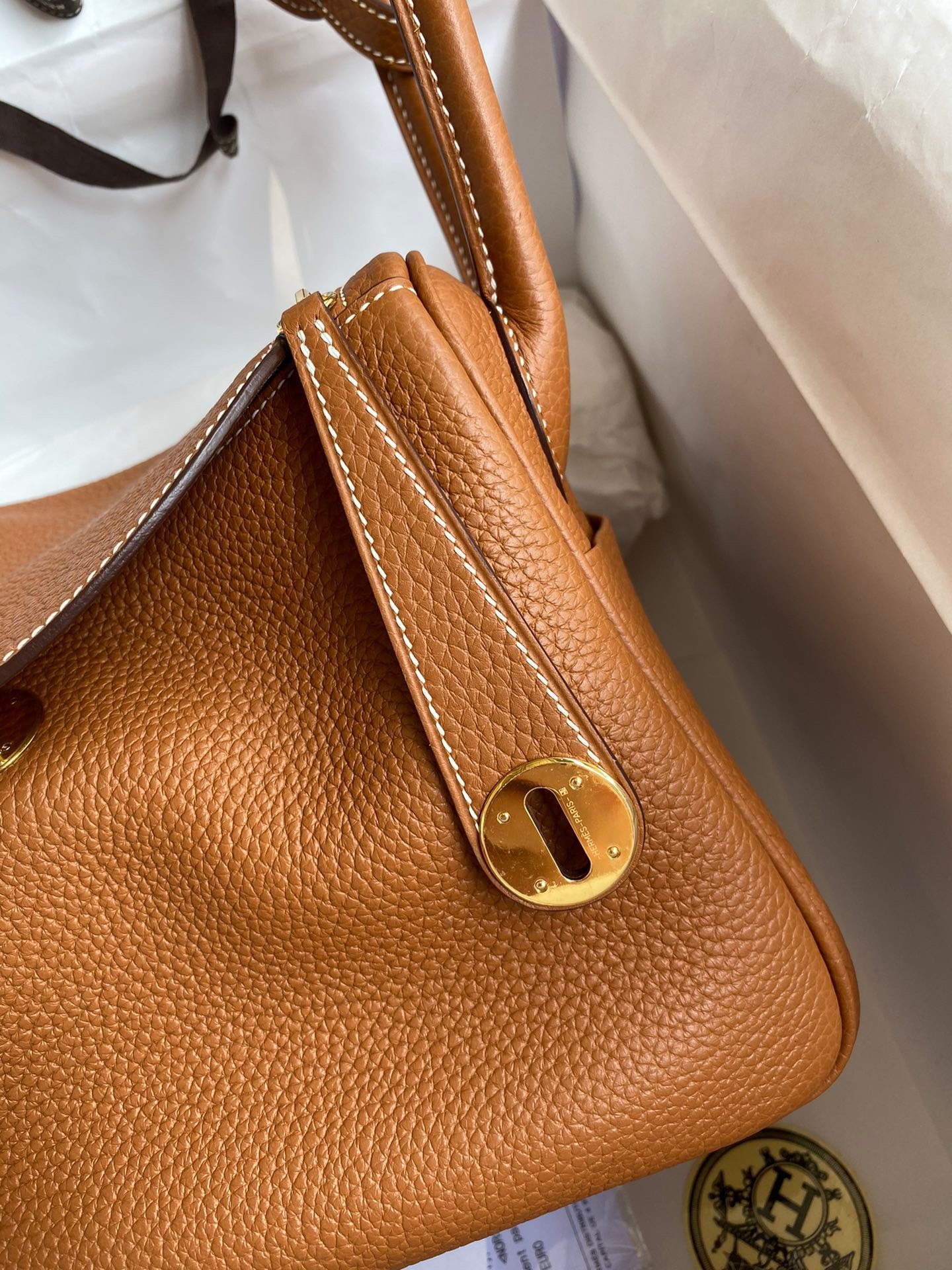 H**mes lindy 26 handmade bag in gold clemence leather