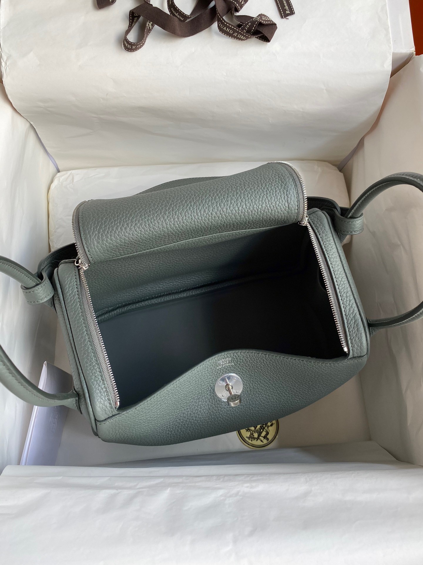 H**mes lindy 26 handmade bag in vert amande clemence leather