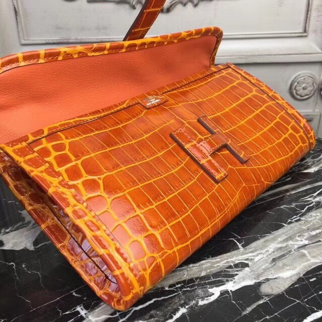 H**mes jige elan 29 clutch in orange crocodile leather