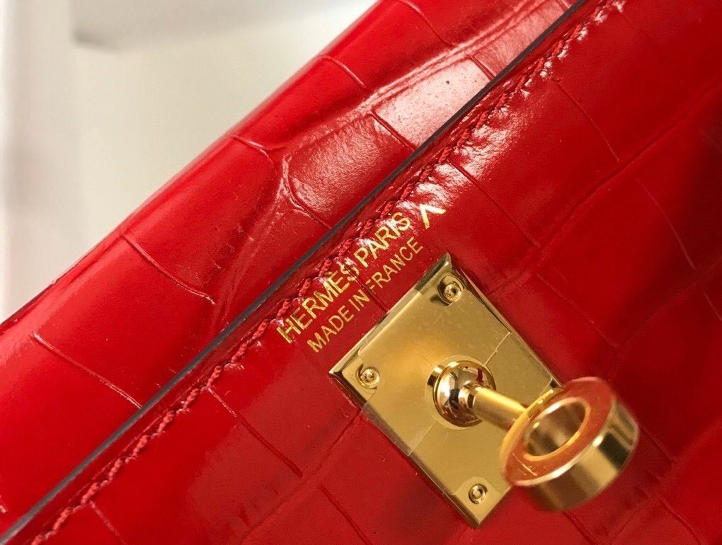 H**mes kelly mini ii bag in red embossed crocodile leather