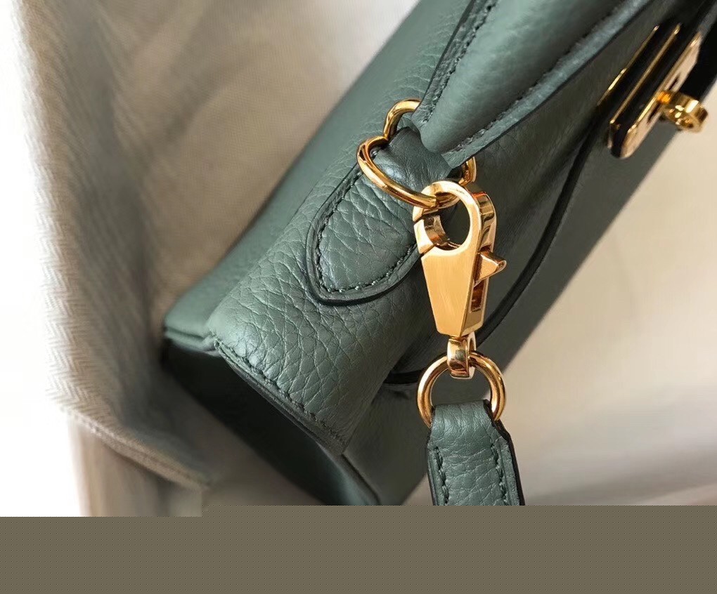 H**mes kelly 25cm retourne bag in vert amande clemence leather
