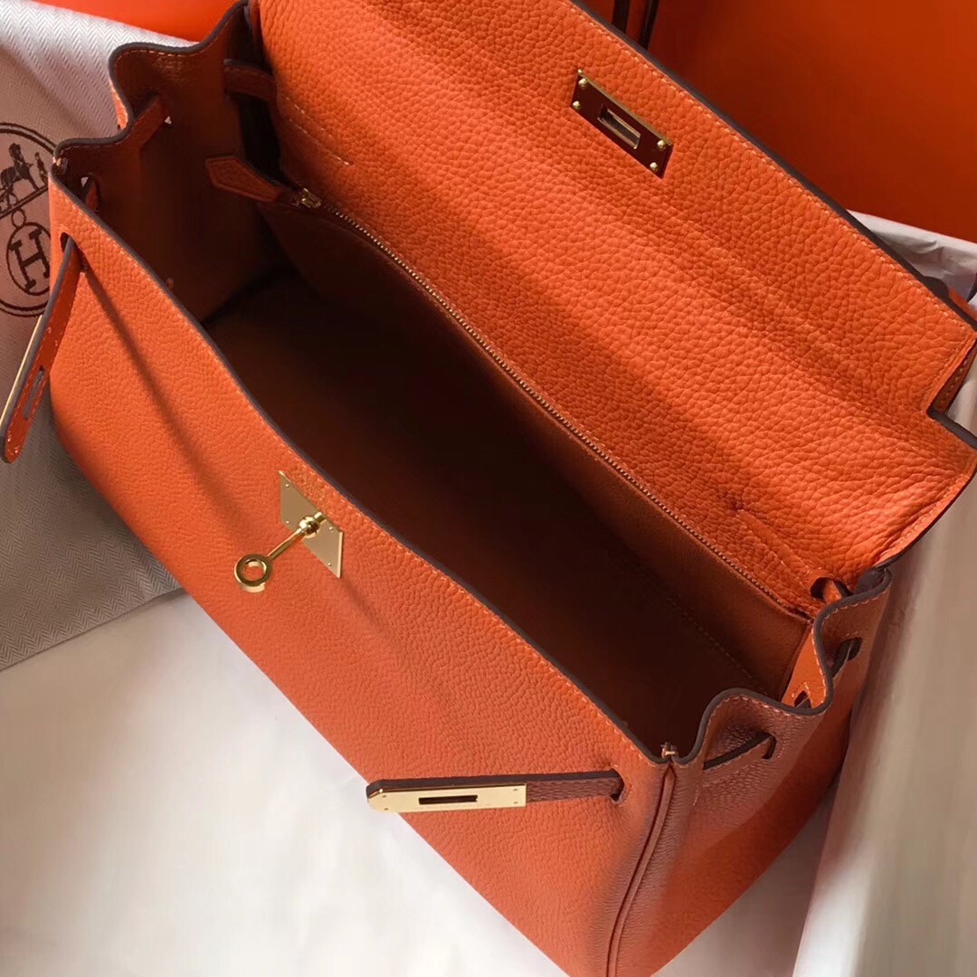 H**mes kelly 28cm retourne bag in orange clemence leather
