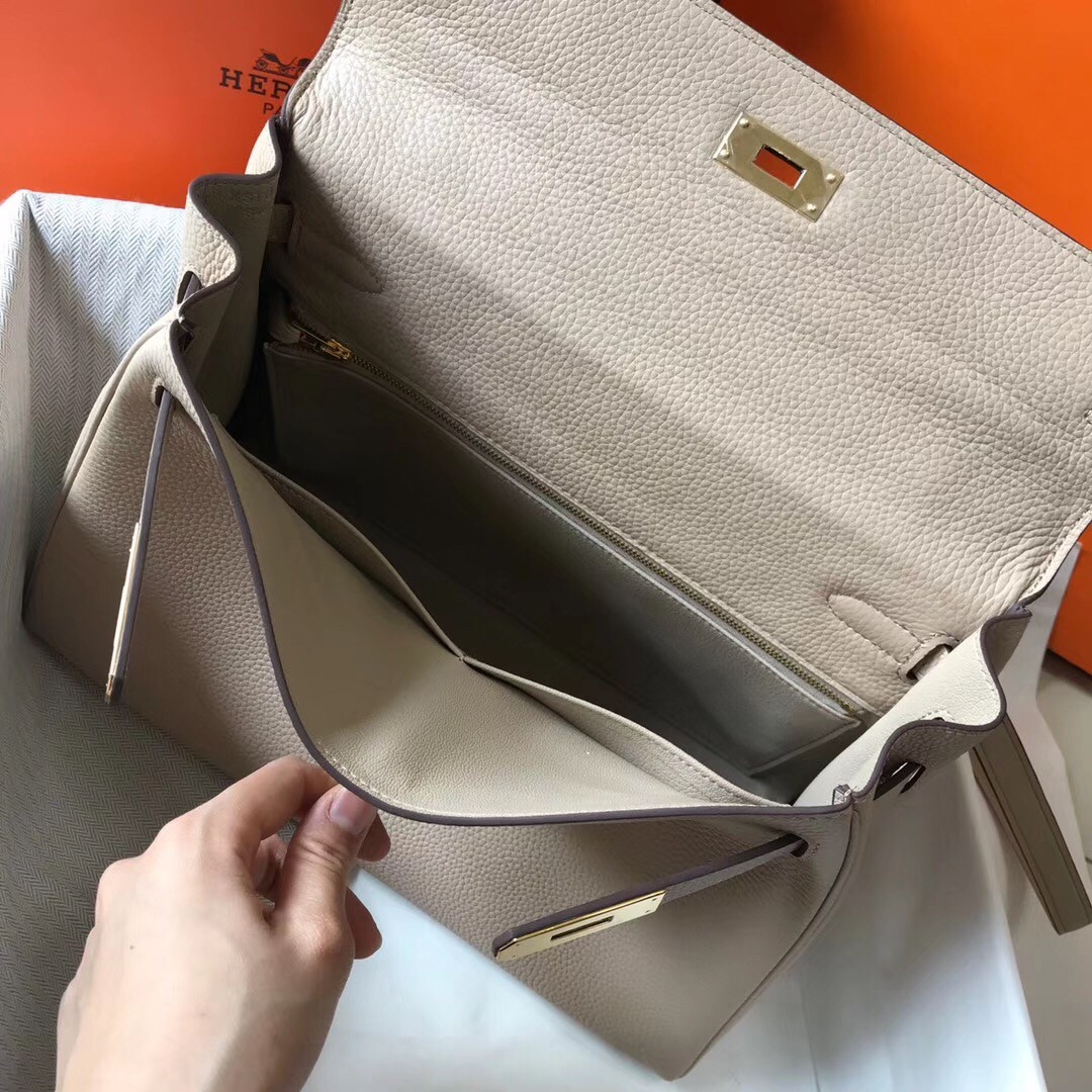H**mes kelly 32cm retourne bag in argile clemence leather