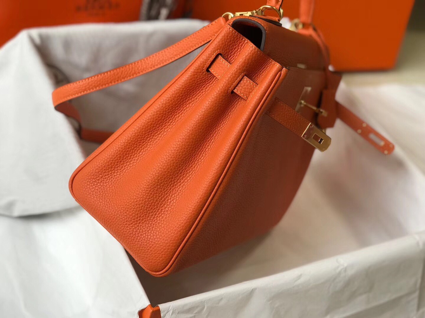 H**mes kelly 32cm retourne bag in orange clemence leather