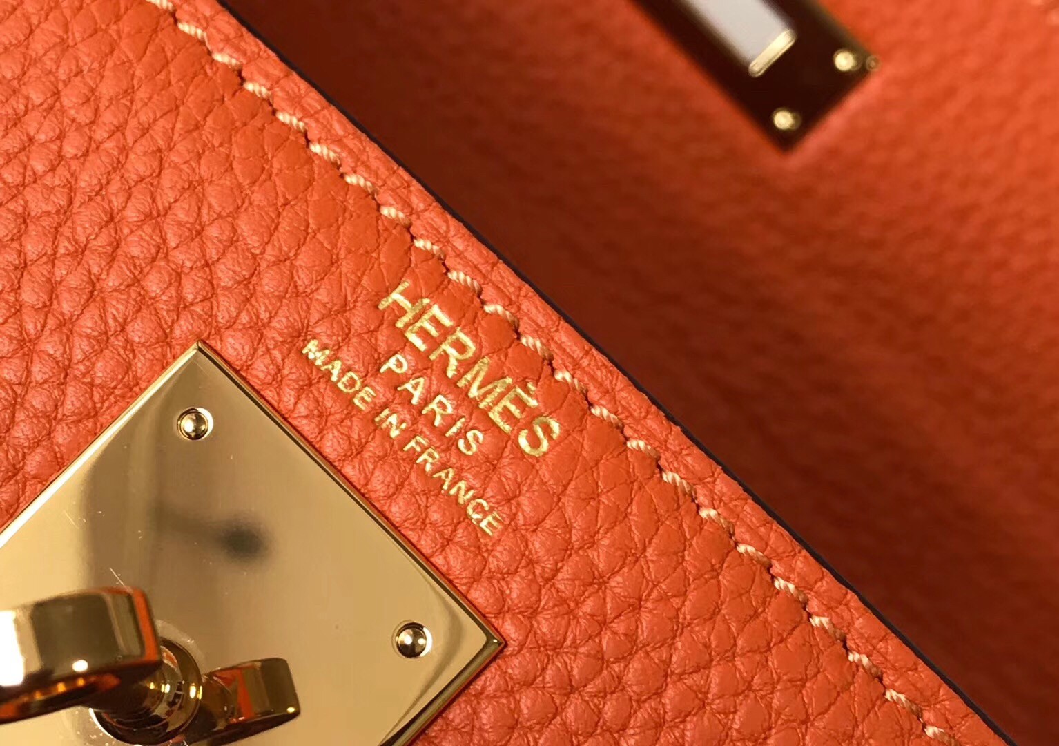 H**mes kelly 32cm retourne bag in orange clemence leather