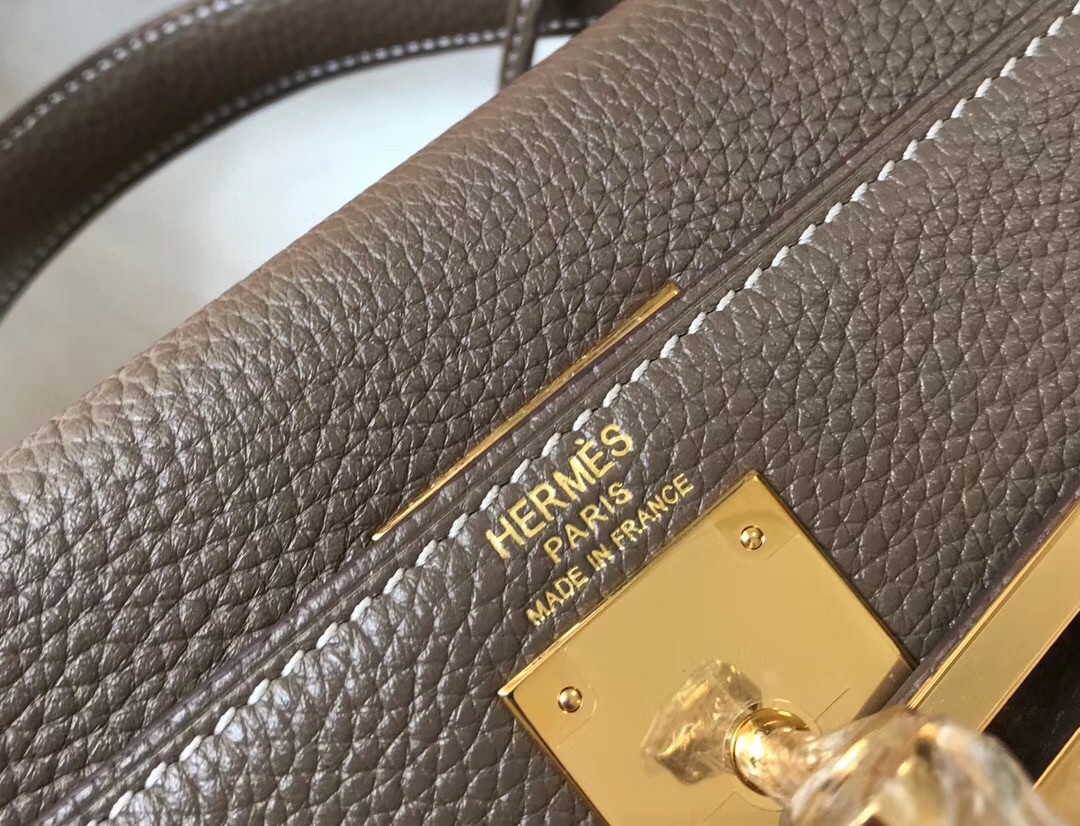 H**mes kelly 32cm retourne bag in taupe clemence leather