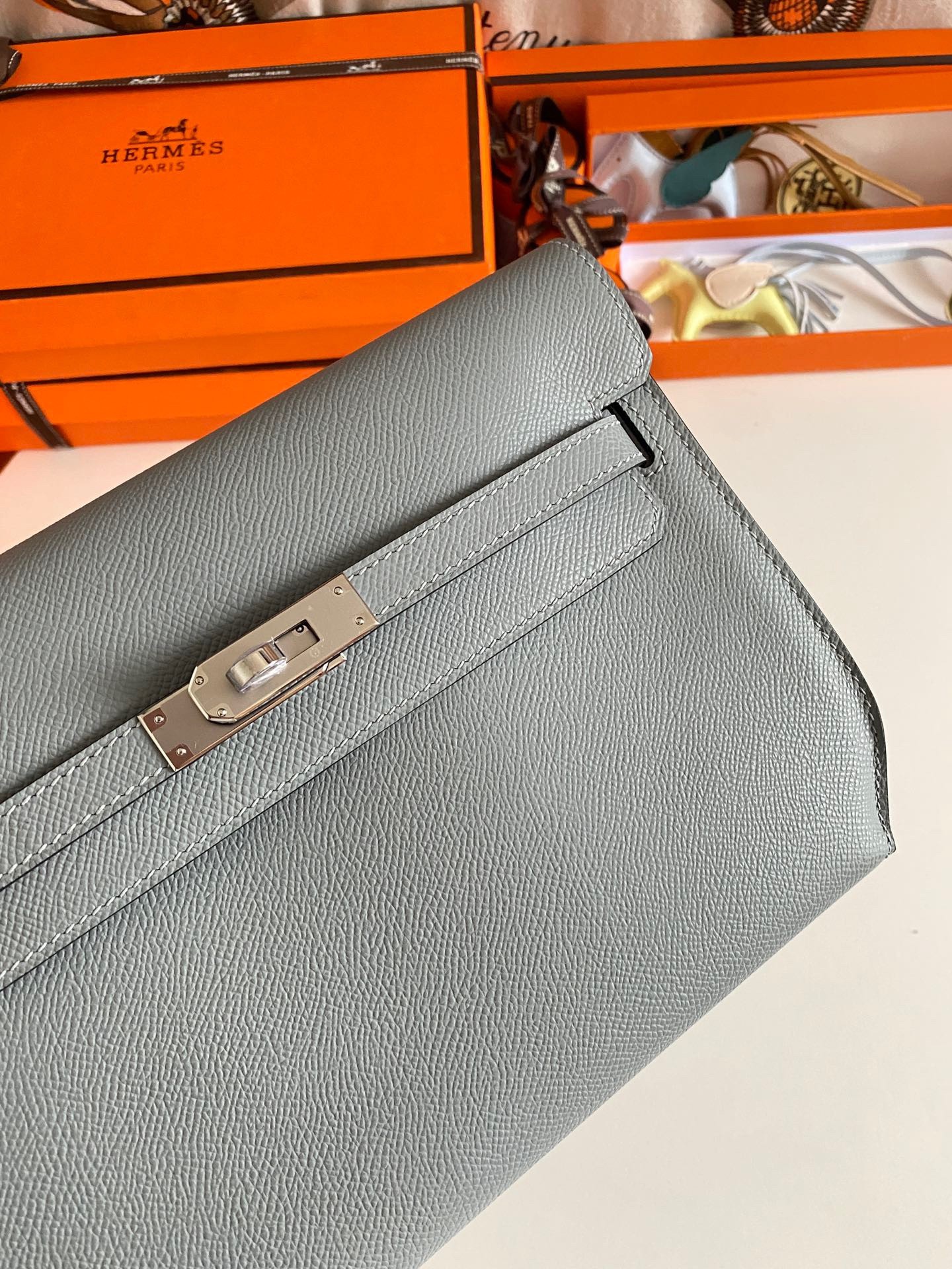 H**mes kelly depeches 25 pouch in blue lin epsom calfskin