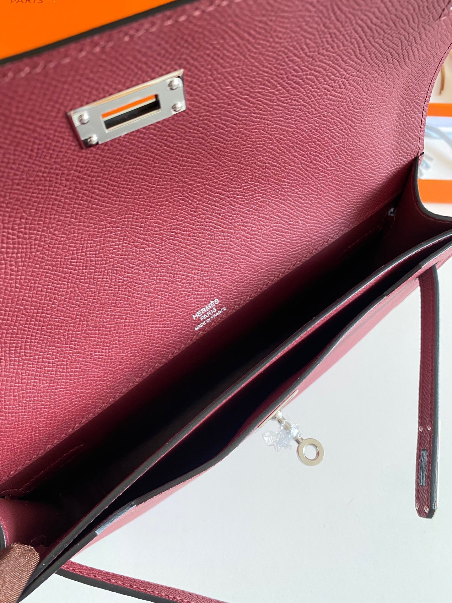H**mes kelly depeches 25 pouch in bordeaux epsom calfskin